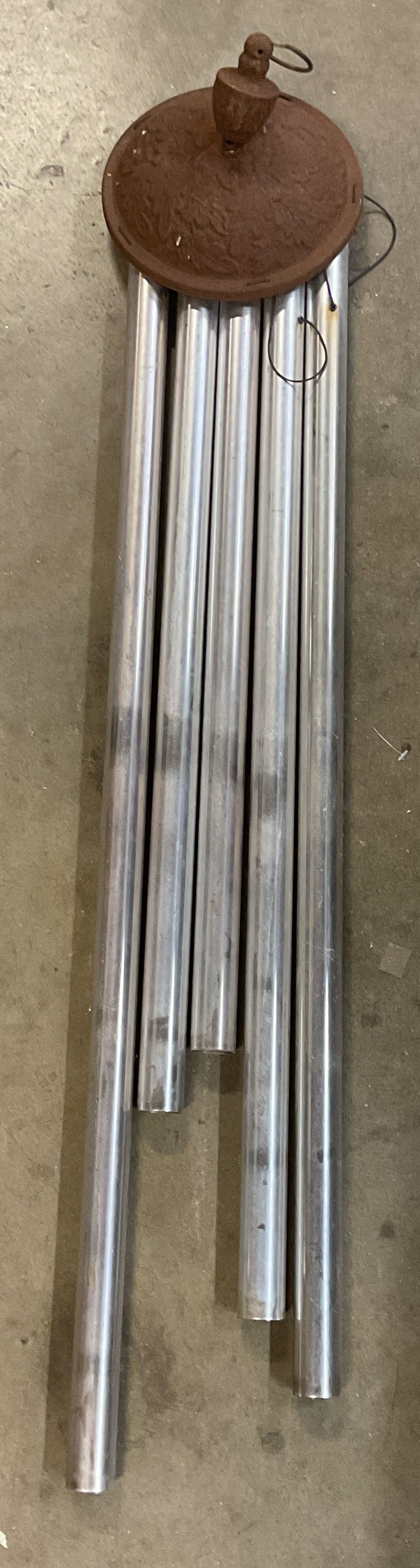 Vintage Silver Tone Tube Wind Chime, 36.5 In L: Vintage silver tone tube wind chime. Measures approx. 36.5 inches long. Surface wear in Doug in scratching and rusting observed. Wind chine, tube wind chime, silver tone wind chime, vintage wind chime