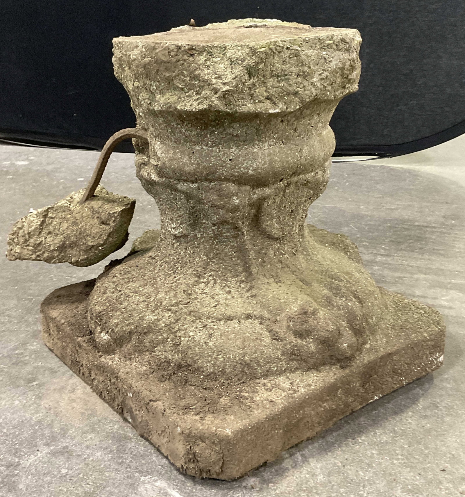 Vintage Cast Stone Garden Plant Stand: A vintage cast stone garden statuary plant stand. Measures approx. 15H x 13.75W x 13.75D in. Metal bar jutting out the side. Cracking, chipping, and surface wear present. Jardiniere, garden accents, g