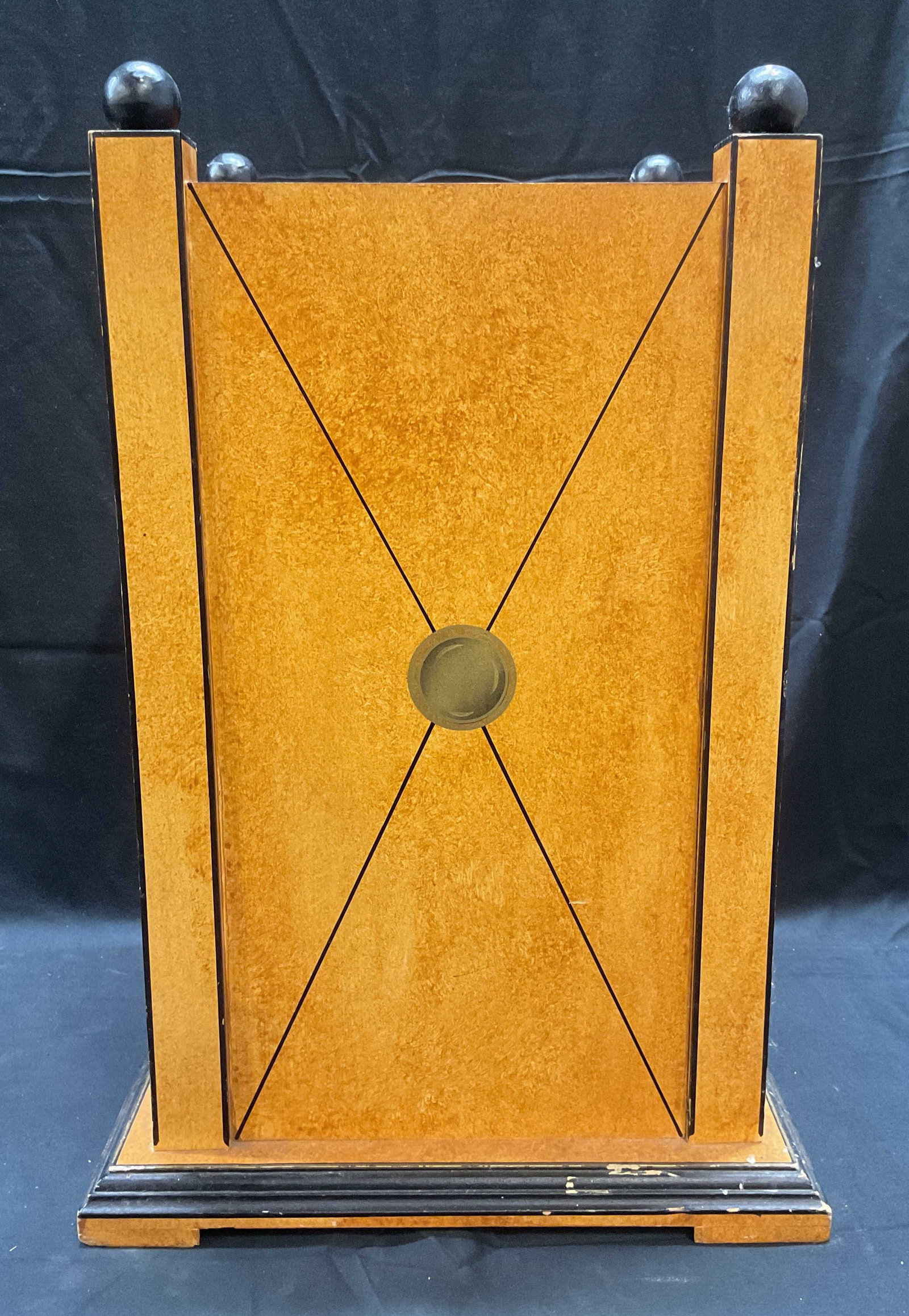 Art & Commerce Wood Umbrella Stand: Art and Commerce wood umbrella stand or waste basket. Hand painted geometric design with rounded finials. Measures approx. 11 x 11 x 16 inches. Signed to underside. Piece has weight. Some surface wear