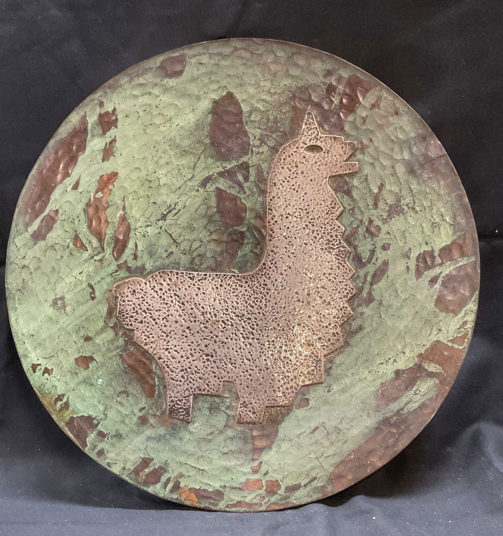 Vintage Hammered Copper Llama Plate: Vintage hammered copper plate with raised silver tone llama motif. Measures approx. 13.75 inches wide. Property of P. T. Barnum estate by family descent. Surface wear including scratching and patina o