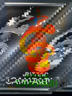 Leonetto Cappiello Bitter Campari Spiritello Litho: Lithograph on paper. Original art by Leonetto Cappiello. Vintage advertisement for Bitter Campari Spiritello Liquor 921. Subject depicts a clown in polka dots dancing inside of a peeling orange holdin