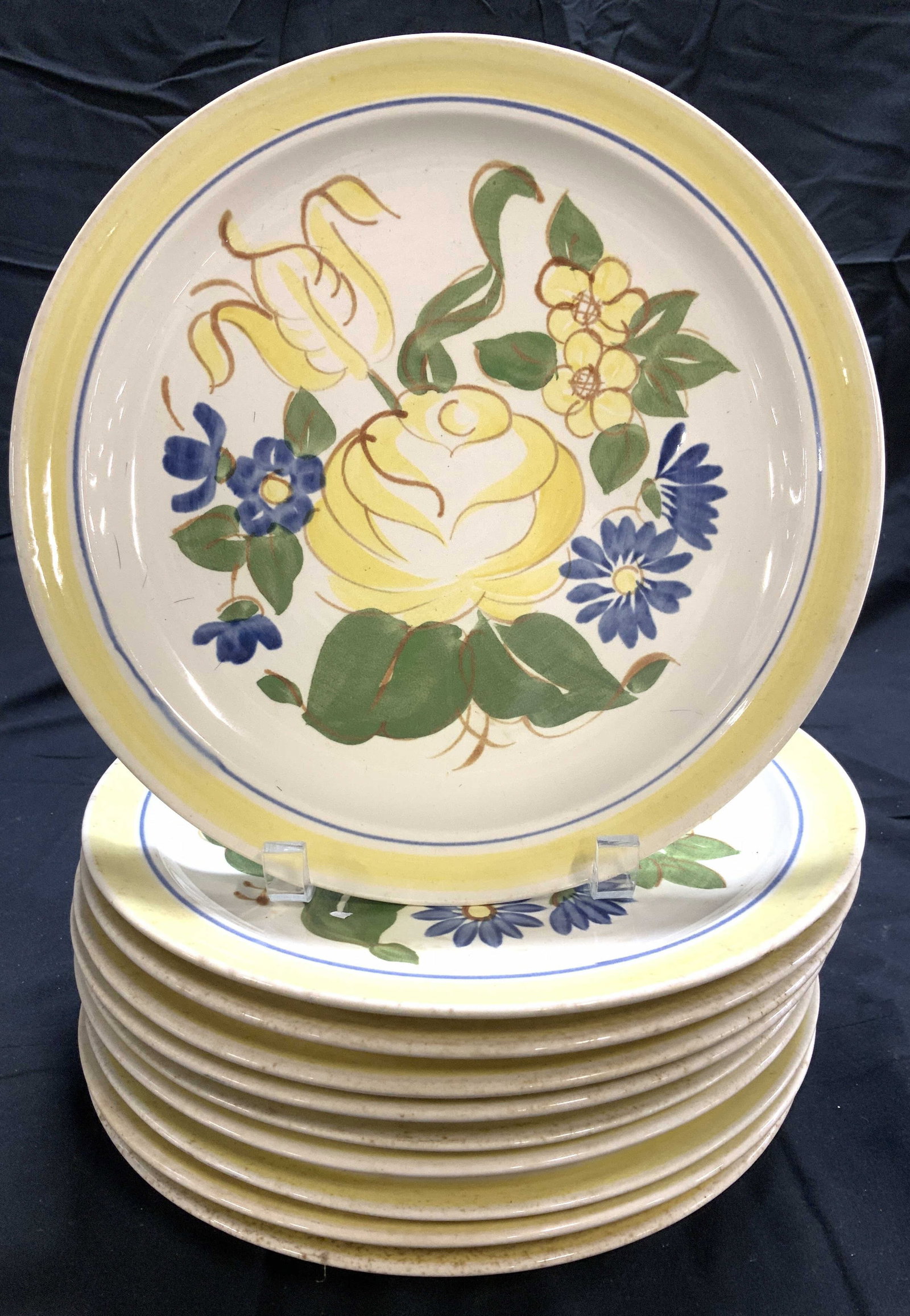 Set 10 Redwing Hand Painted Ceramic Plates: Mid century hand painted ceramic plates, marked Redwing. 10.25 in. Many have glaze crazing and/ or discoloration . 1 has a rim chip. Property of P.T. Barnum Estate through family descent. Mid century 