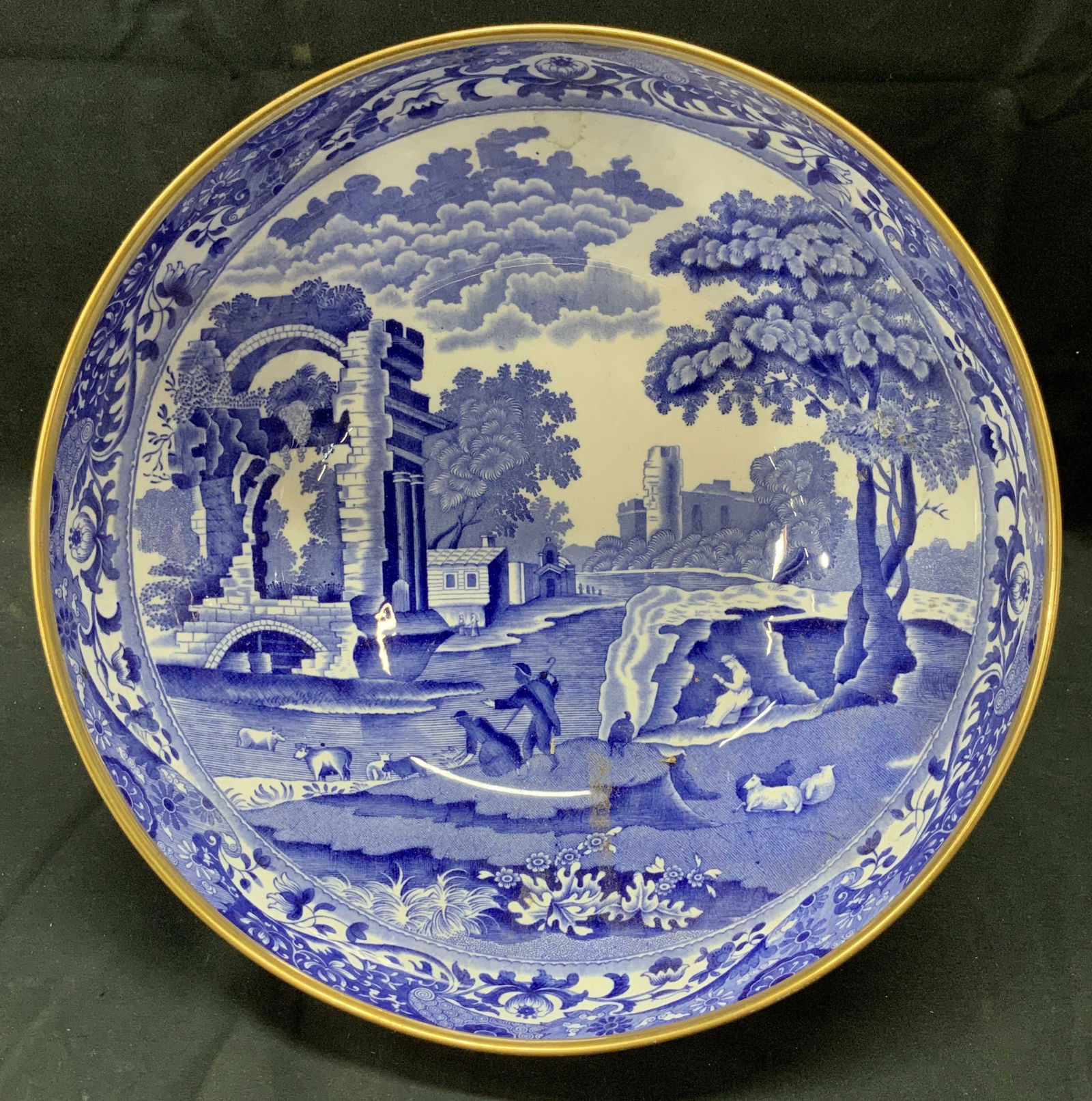 SPODE Cobalt & White Bone China Bowl, England: Luxury Spode Bone China footed bowl. Made in England. Hand painted cobalt blue on white China, accented with 24k gilt. Scene of 20th century castle and farmland along a river. Trademarked in green ink