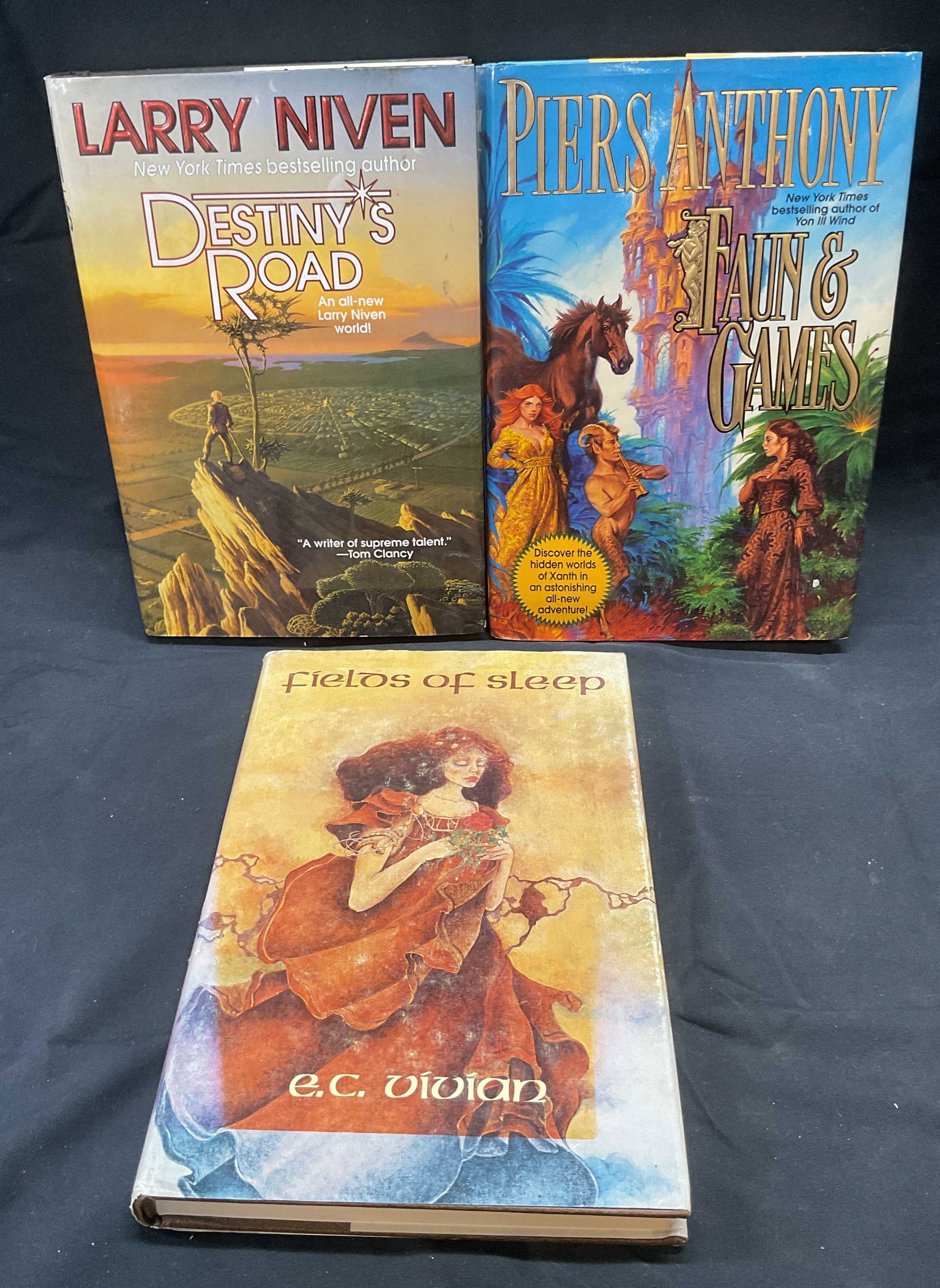 Lot 3 Vintage Fantasy Books, Piers Anthony 1980-97: Lot of 3 vintage hardcover fantasy books. Faun and Games by Piers Anthony ( Tor, 1997). Destineys Road by Larry Niven (Tor, 1997). Fields of Sleep by E. C. Vivian (Grant, 1980), illustrated. Largest b