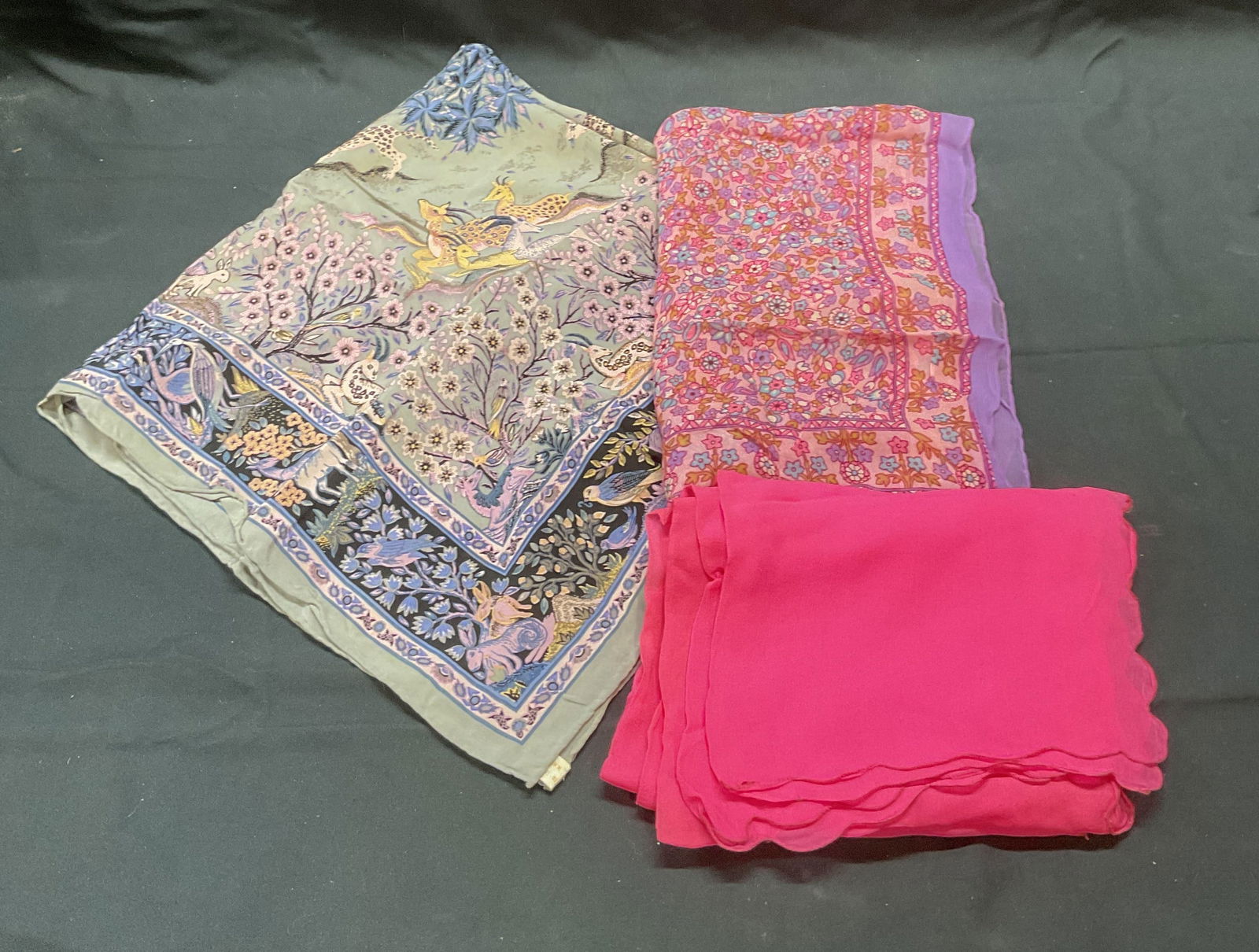 Lot 3 Mitsukoshi & Glentey Silk Scarves +: Lot of 3 silk scarves. Vintage Mitsukoshi silk scarf in grey and purple with animal and floral motif. Vintage Glentey silk scarf in purple and pink with floral motif. Vintage pink silk scarf with scal