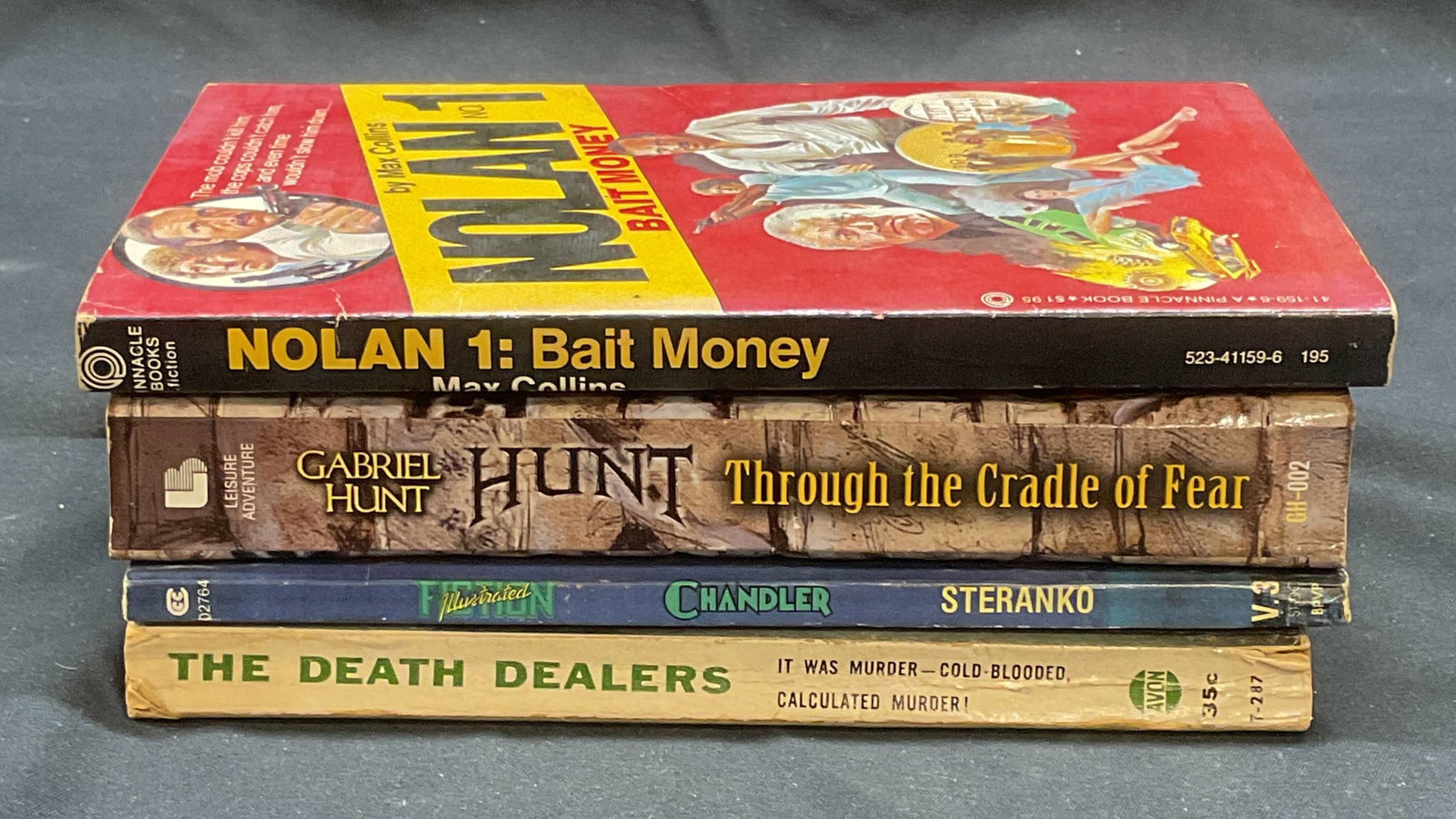 Lot 4 Vintage Detective, Crime, Mystery Books: Lot of 4 vintage softcover detective, crime, and mystery books. The Death Dealers by Isaac Asimov, Avon, 1958. Nolan No 1 Bait Money by Max Collins, Pinnacle Books, 1981. Chandler by Steranko, Pyramid