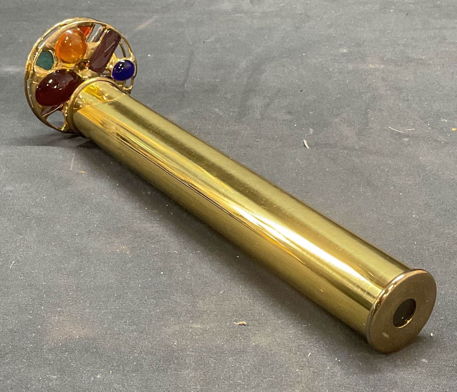 Signed Brass Crystal & Agate Kaleidoscope: Signed brass kaleidoscope with crystal, glass, and agate accents. Signed on body illegibly. Measures approx. 8.5 inches long. Includes box. Some suede wear including scratching observed. Kaleidoscope,