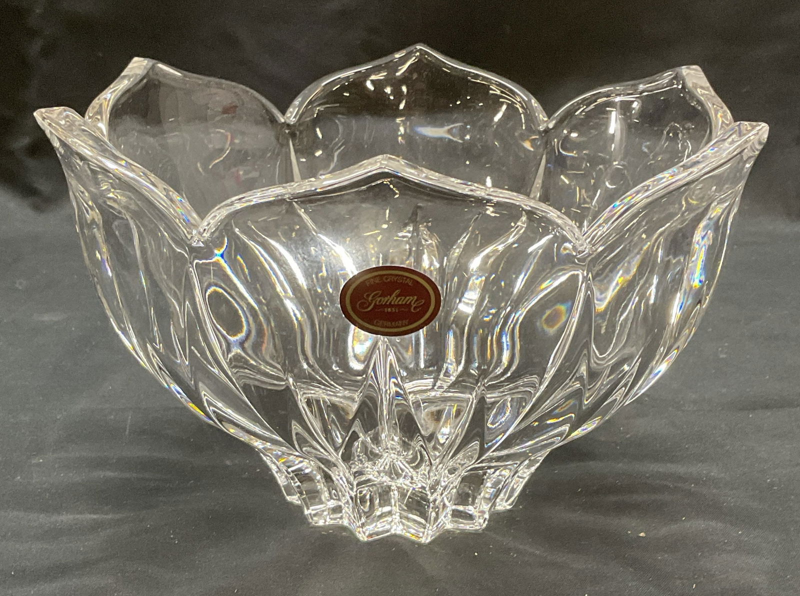 GORHAM Fine Crystal Flower Bowl, Germany: GORHAM fine crystal bowl. Lotus flower shape with scalloped rim. Signed on sticker. Made in Germany. Measures approx. 7.75 x 4.75 inches. Thick walled crystal piece has weight. Some surface wear inclu