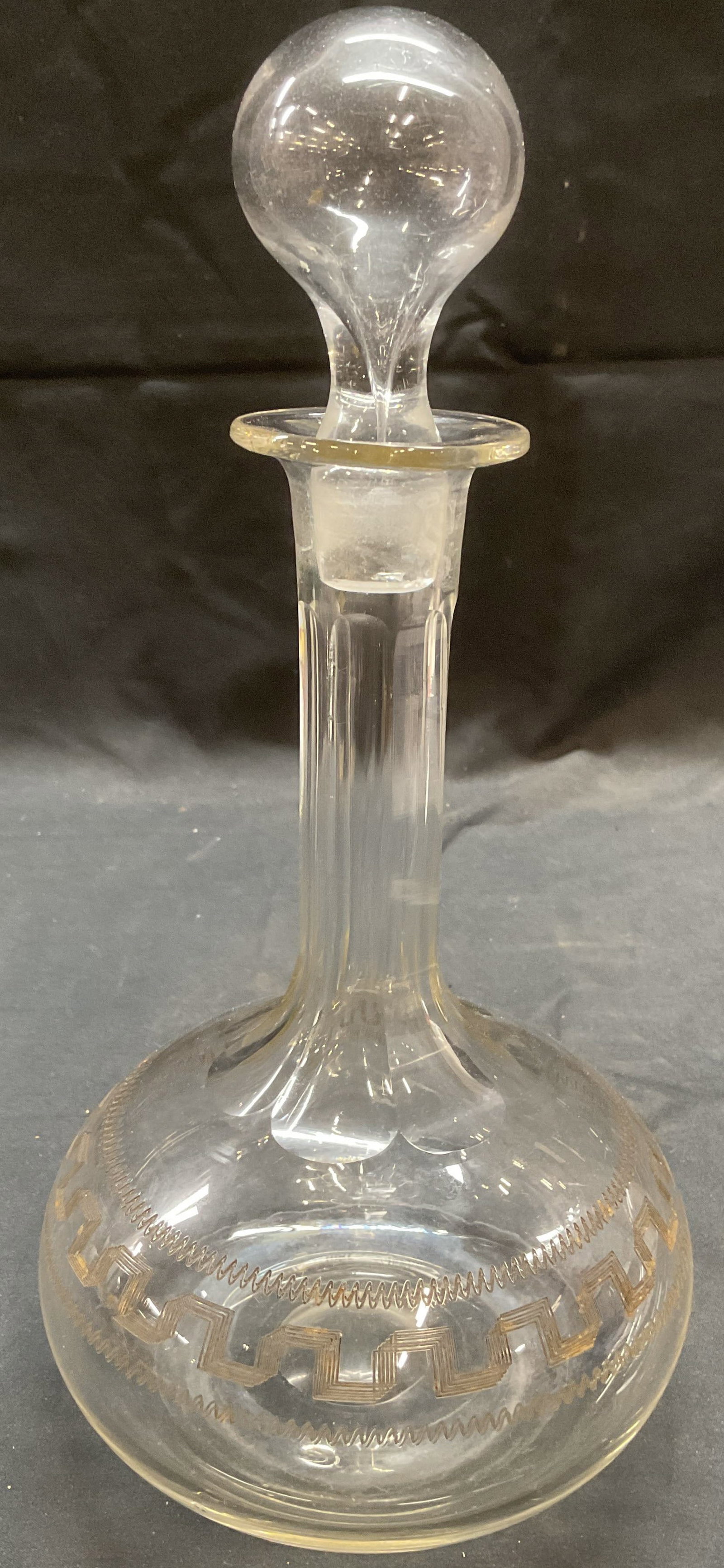 Vintage Etched Glass Bulb Decanter: Vintage etched glass decanter. Bulb shape with geometric etched pattern. Measures approx. 5 x 10.75 inches. Some surface wear including scratching observed. Decanter, etched decanter, glass decanter, 