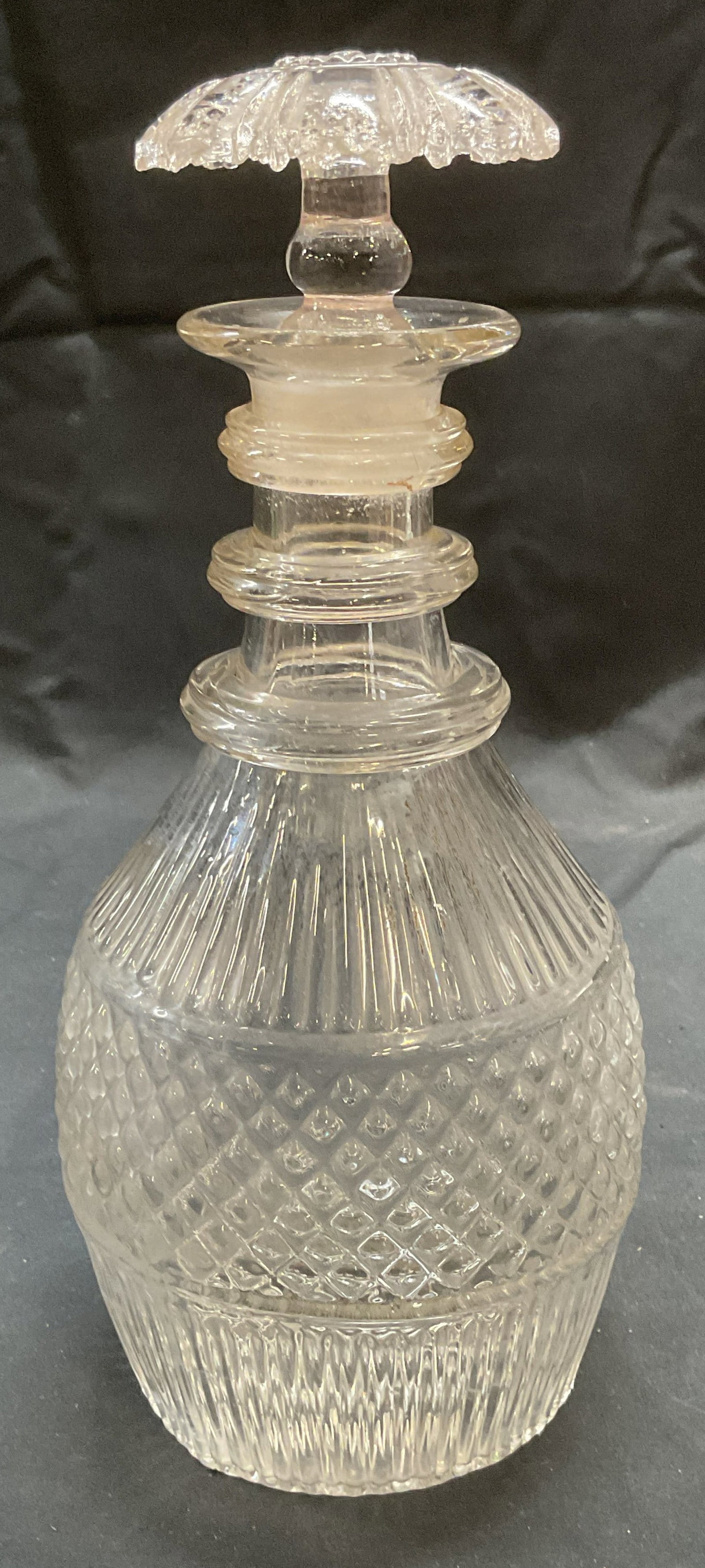 Vintage Hand Blown Glass Decanter: Vintage hand blown glass decanter with raised stripe and diamond pattern. Measures approx. 4.25 x 9.75 inches. Some surface wear including chipping on stopper and scratching observed. Interior rim has
