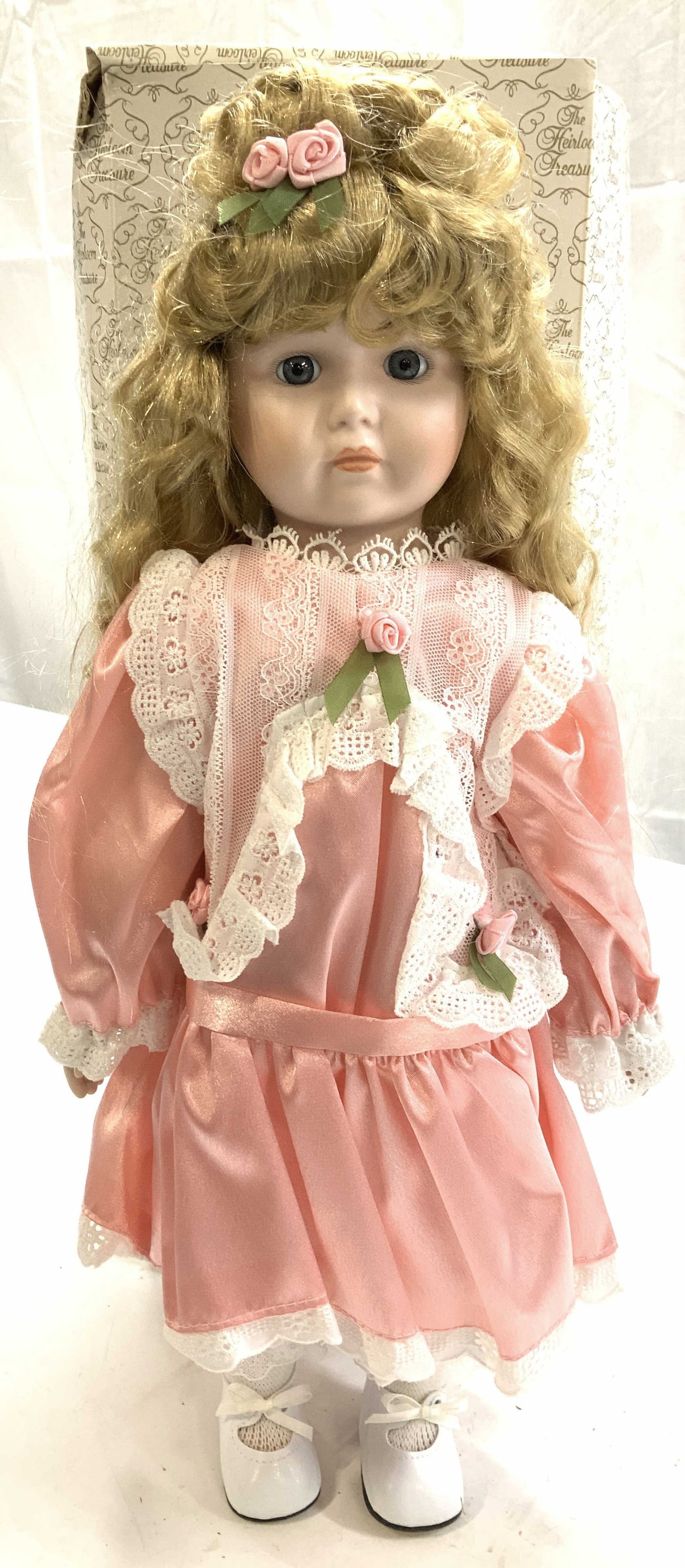 Collectible Heirloom Treasure Porcelain Doll , NIB: 16 in. Heirloom Treasure Doll , in original box and in org. packaging. Porcelain face, hands and feet. Doll is signed on backside. Collectible Porcelain Doll, New in box Heirloom Treasure Porcelain do