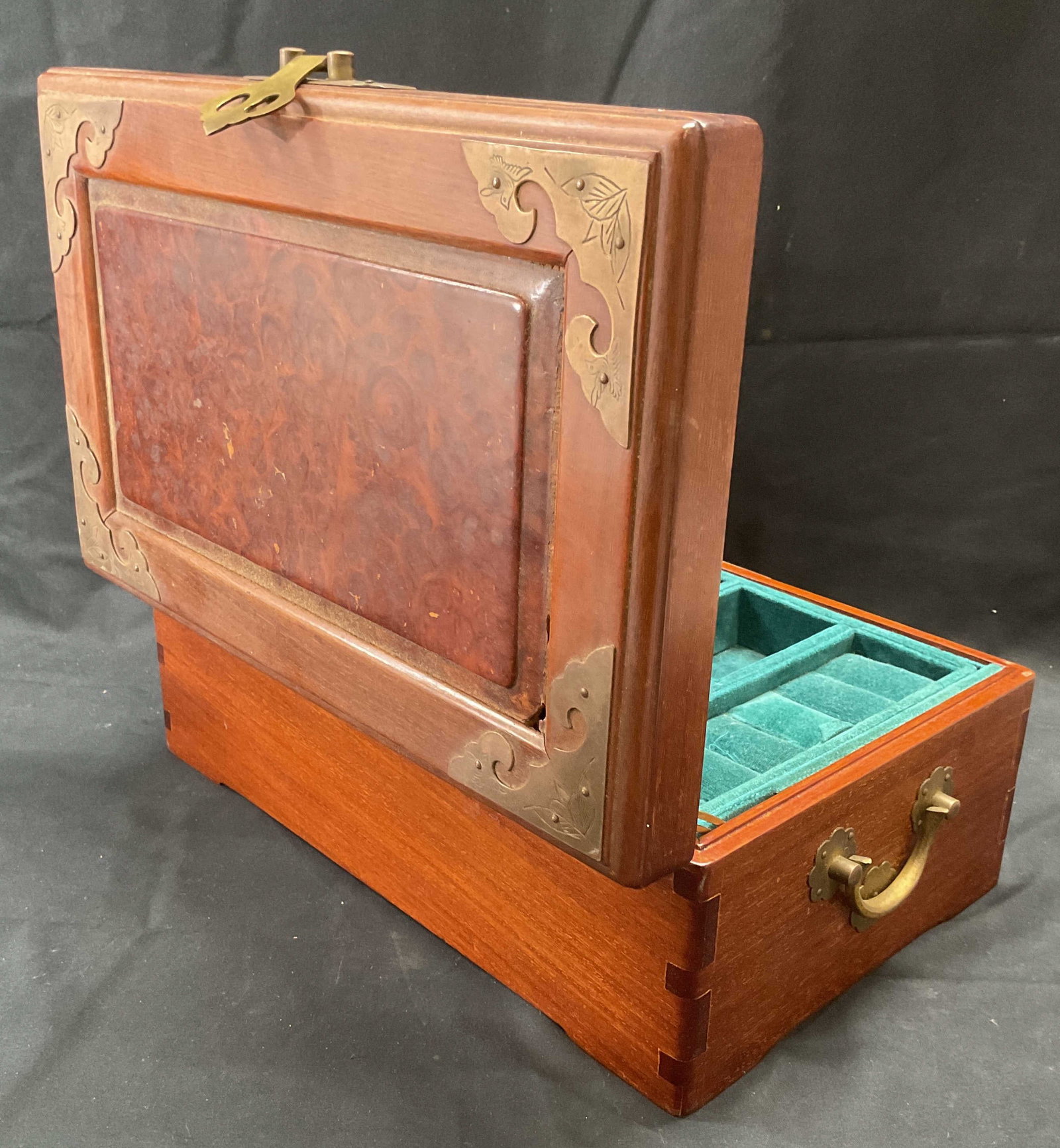 Burl Wood Inlay & Brass Accent Jewelry Box: Wooden jewelry box with Burlwood inlay panel, etched brass accents and latch closure. Multiple fitted compartments to interior with removable tray. Blue felt lined. Measures approx. 13 x 8 x 5 inches.