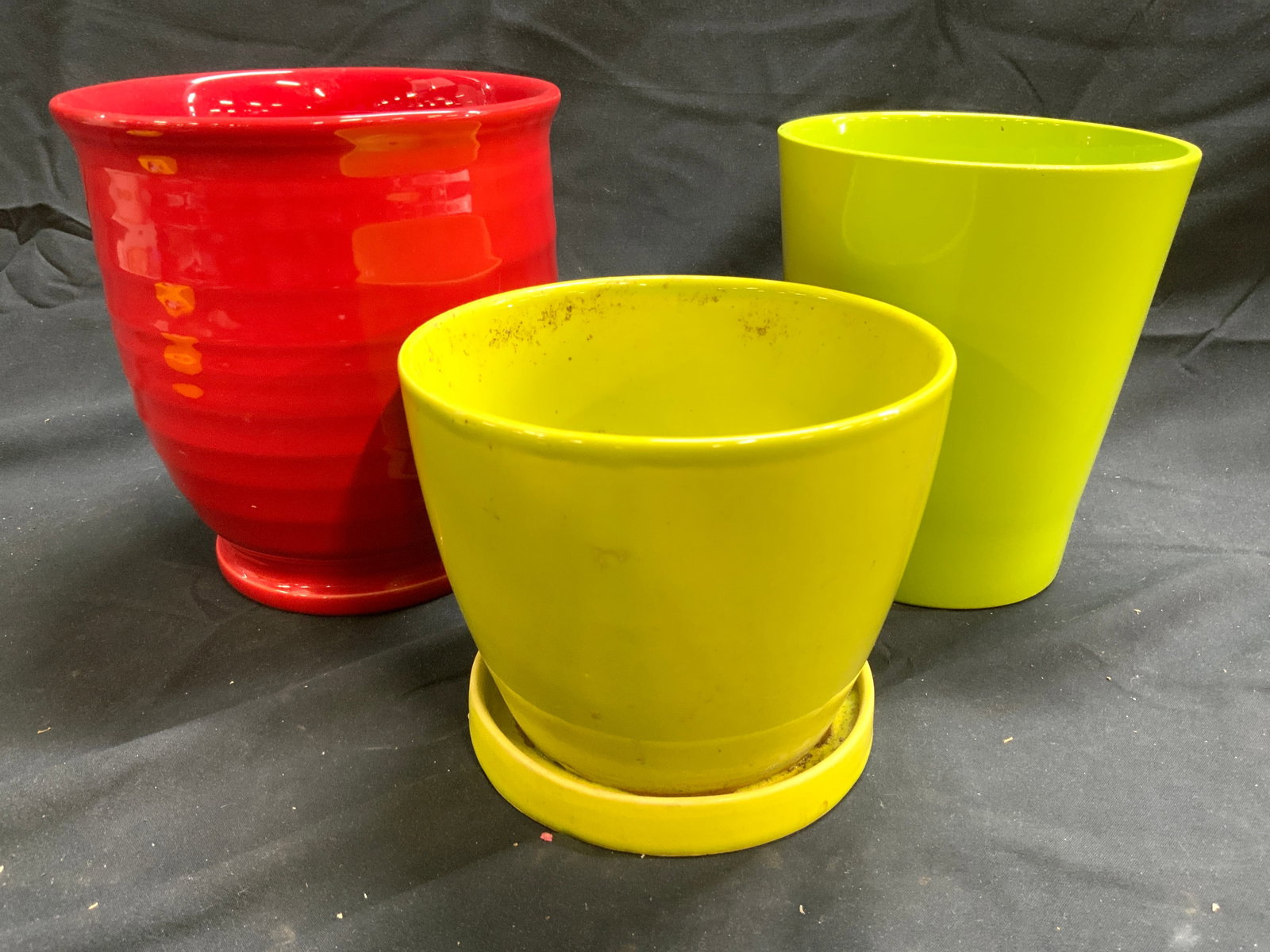 Lot 3 Porcelain Planters Green Red Portugal More: Underside of red planter reads MADE IN PORTUGAL. Lot includes 1 red & 2 green planters. One green planter has attached drainage dish. Largest planter (red) measures approximately 6.5 inches tall 6 inc