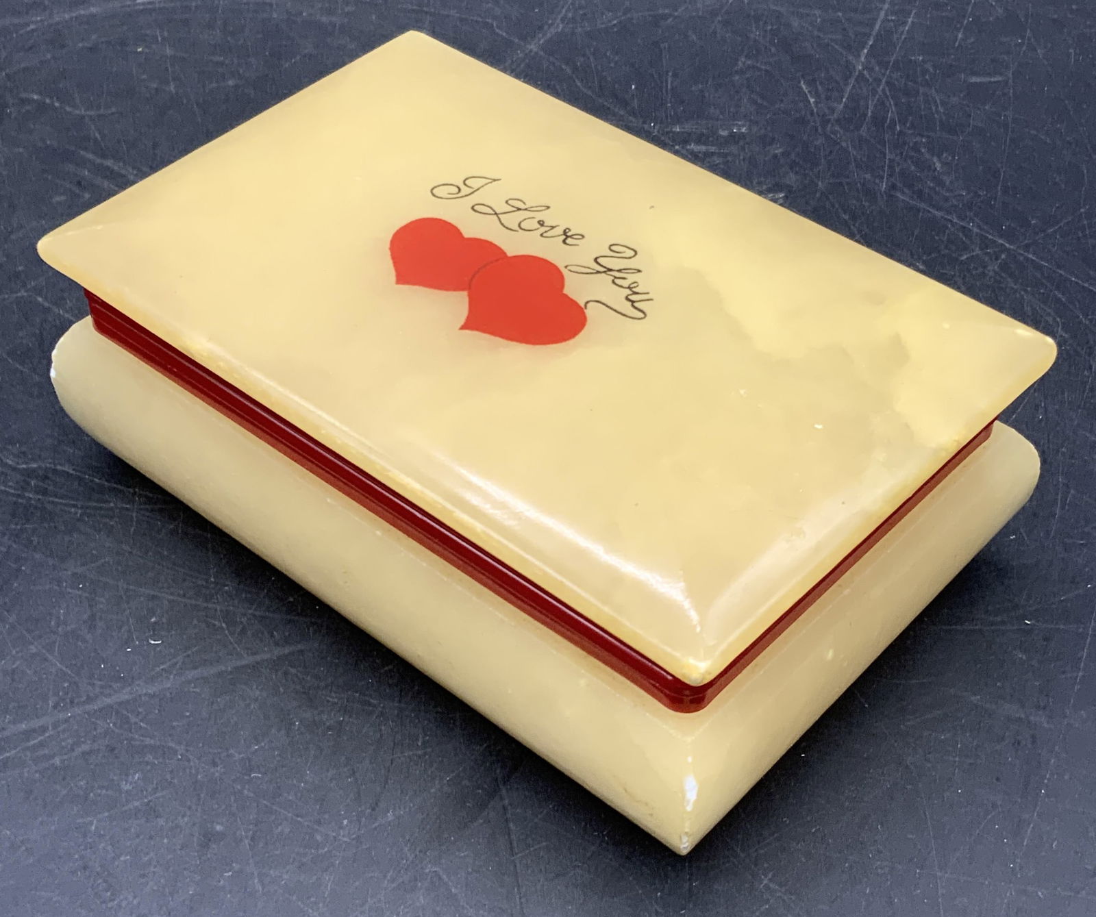 Ducceschi I LOVE YOU Alabaster Trinket Box, Italy: Hand carved alabaster hinged trinket box. Heart motif to the obverse. Above the hearts lettering reads I LOVE YOU. Underside sticker reads Ducceschi, Made in Italy, Genuine Alabaster, Hand Carved. Mea