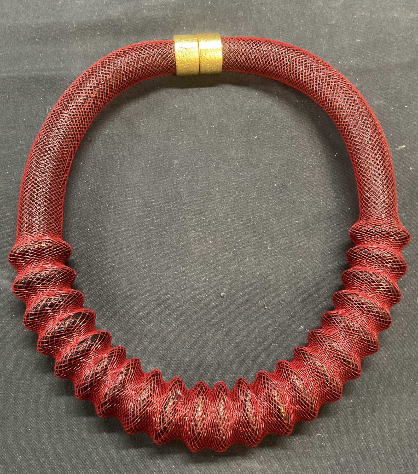Red Mesh Chain Choker Necklace: Red mesh chain choker necklace with raised wave design and gold tone magnetic clasp. Drop length approx. 6 inches. Some surface wear including scratching observed. Jewelry, estate jewelry, costume jew