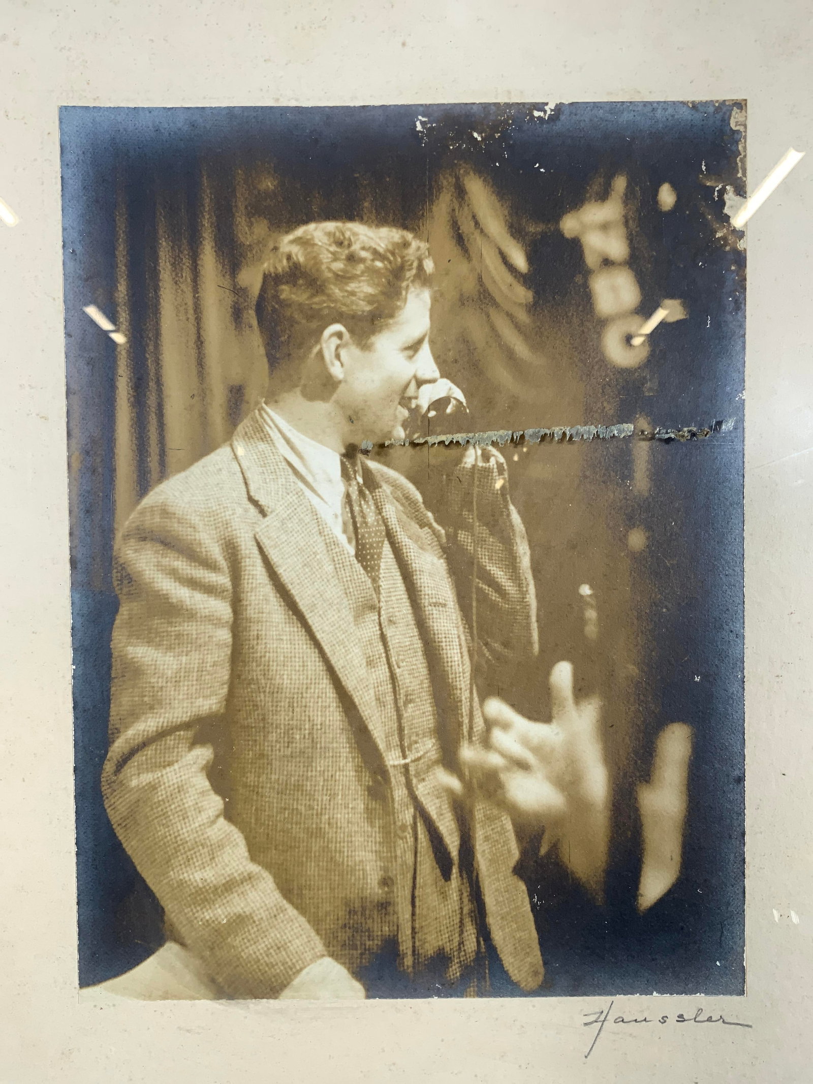 Sepia Toned Signed Photograph NBC Radio: Sepia toned Photograph. Signed in lower right corner. Signature illegible, possibly Haussler. Subject depicts a man on the phone looking at something to the right, the NBC sign is unfocused behind him