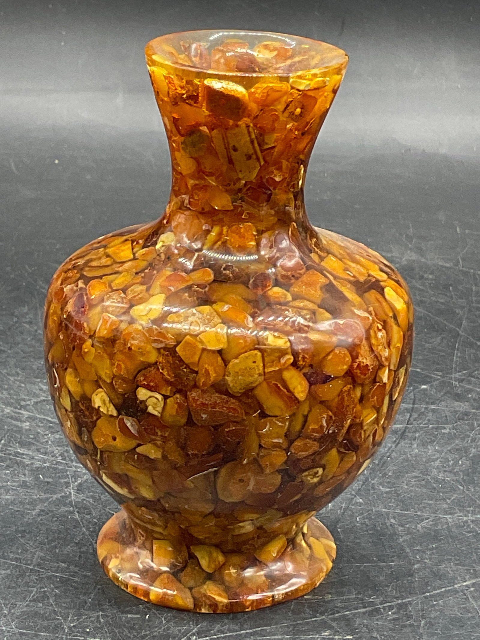 Amber Toned Resin Shard Vase: Amber hued resin shard vase. Measures approx. 4.5H x 2.5W in. Surface wear consistent with age, use, and exposure. Bud vase, vessel, vases, tableware, Amber Toned Resin Shard Vase, home decor, home ac