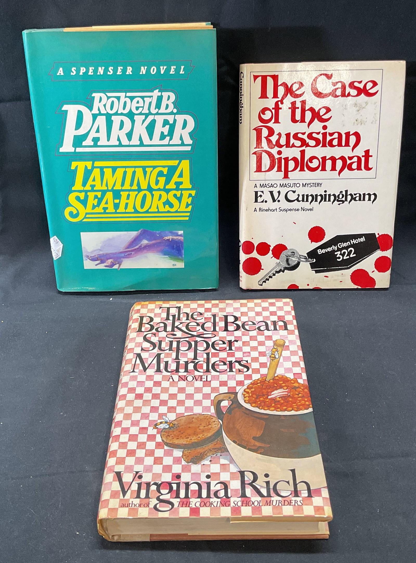 Lot 3 Vintage Mystery Suspense Books: Lot of 3 vintage hardcover books. The Case of the Russian Diplomat by E. V. Cunningham. Holt, Rinehart, Winston, 1978. The Baked Bean Supper Murders by Virginia Rich. Dutton, 1983. Taming A Sea Horse 