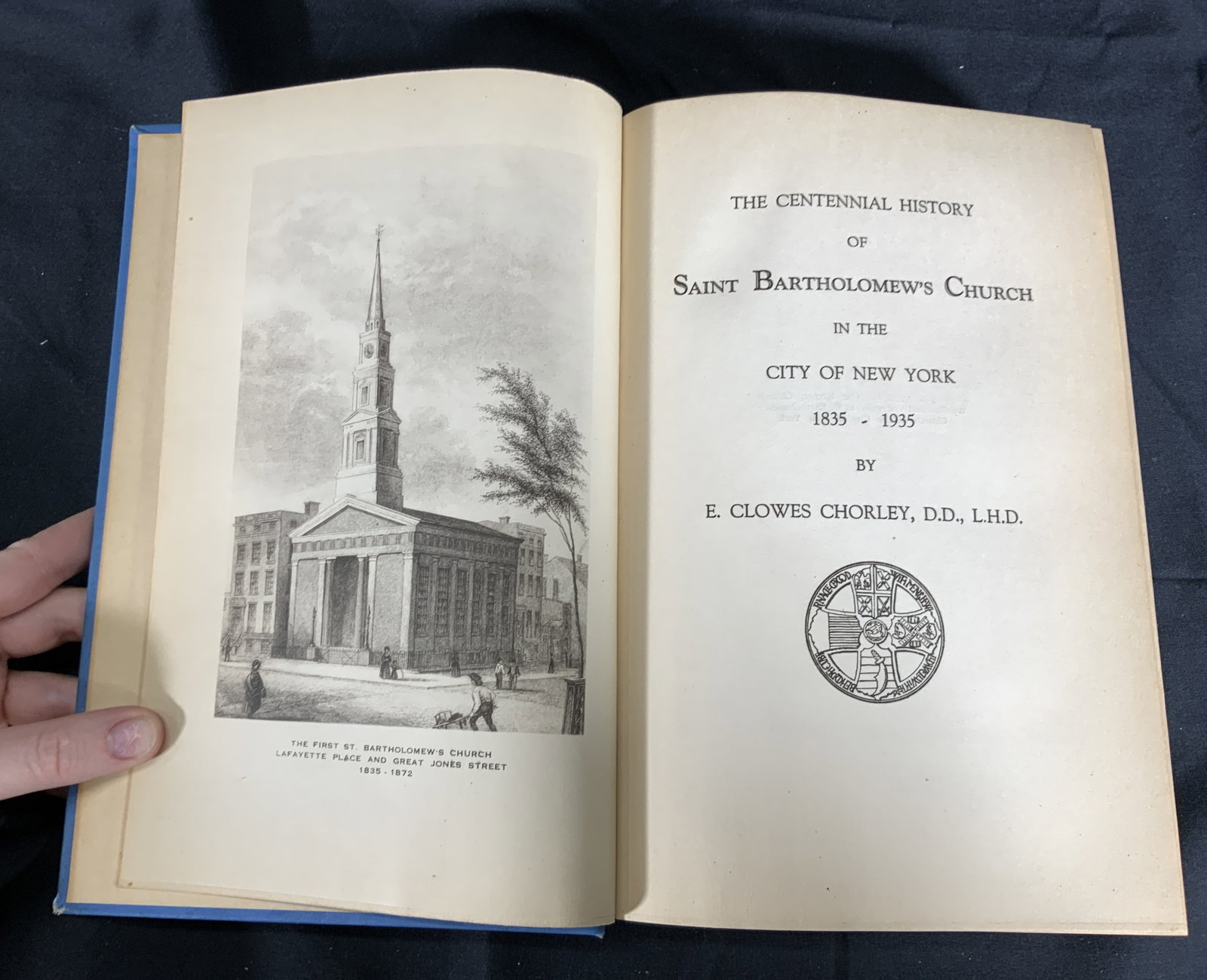 The Centennial History of St. Bartholomews Church: Hardcover book. Titled The Centennial History of St. Bartholomews Church. By E.Clowes Chorley. Publisher unknown. Copyright 1935. Book measures approx. 9 H x 6.5 W in. Minor foxing and wear to cover a