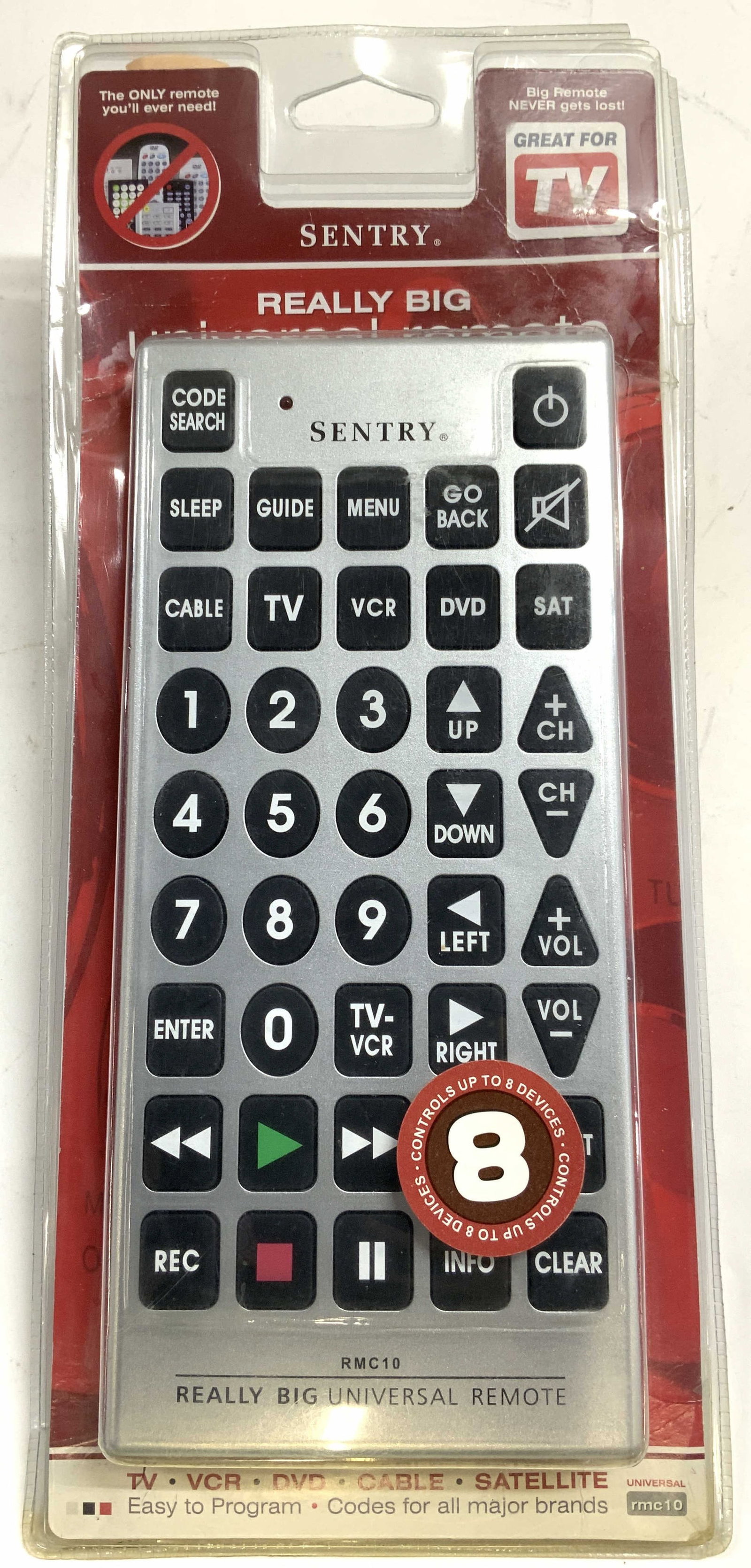 SENTRY RMC10 Large Universal Remote NIP: Packaging reads SENTRY RMC10. Remote is silver toned with black buttons with white toned lettering and numbers. Piece also has play and stop button. Remote is oversized. Remote measures approximately 