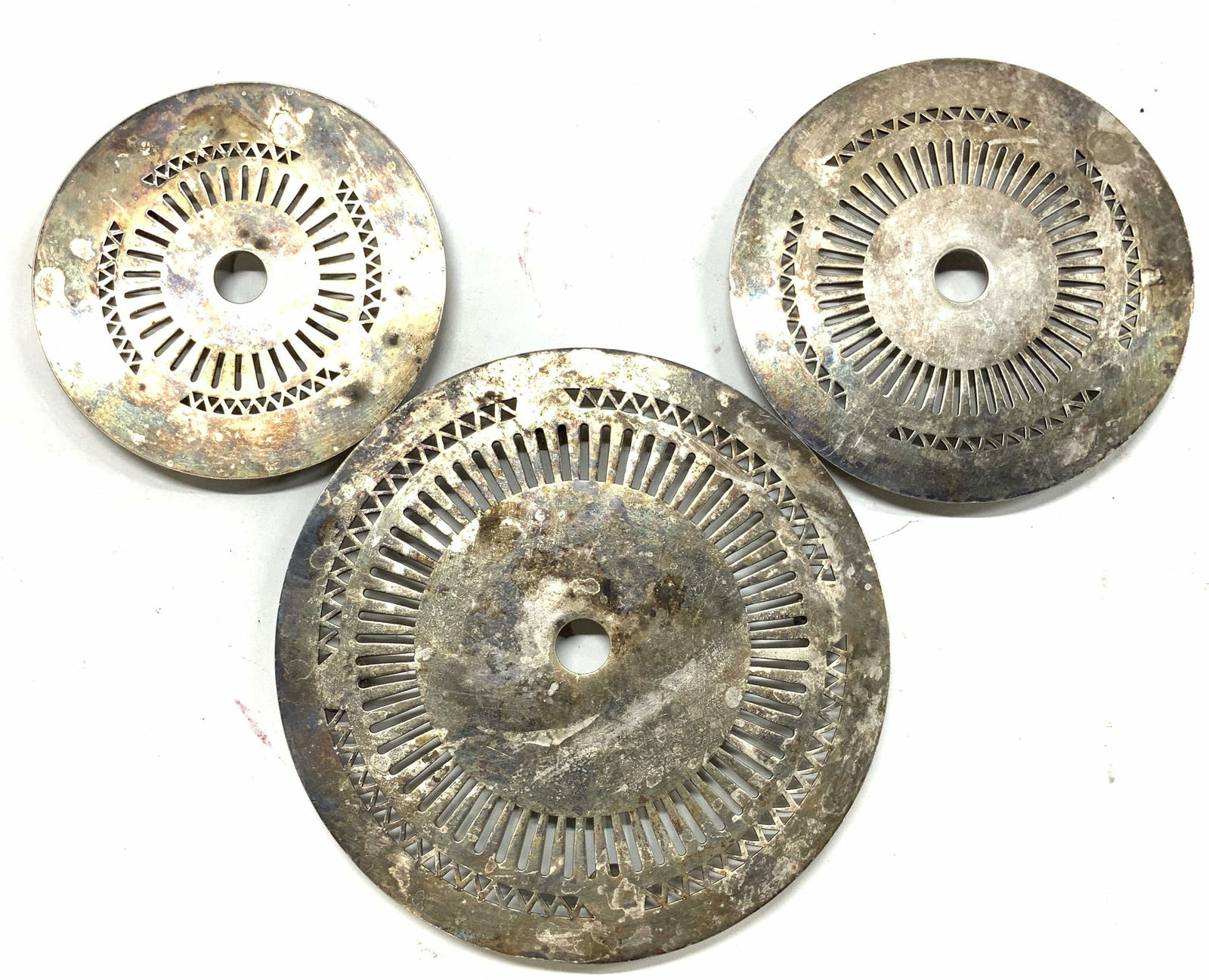 3 GM Co Silver Plated Antq Trivets, Biltmore Rye: Biltmore Rye Country Club & Hotel Memorabilia., Set 3 Silver Plated Trivets, c. 1922. Signed Biltmore, Rye, with manufacturer GM Co. reads EP for electro plate. Larger trivet measures 7.25 in. Diamete