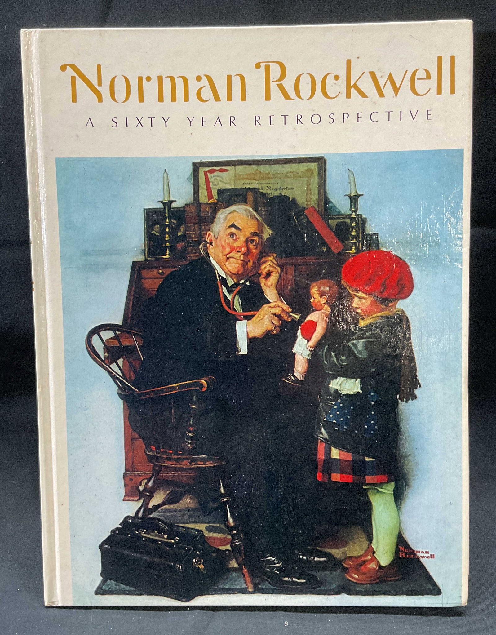 Norman Rockwell 60 Year Retrospective Illustr 1972: Hardcover copy of Norman Rockwell A Sixty Year Retrospective. Text by Thomas S. Buechner. Published by Abrams, 1972. Measures approx. 12 x 9 inches. Wear to covers, pages, and binding consistent with 