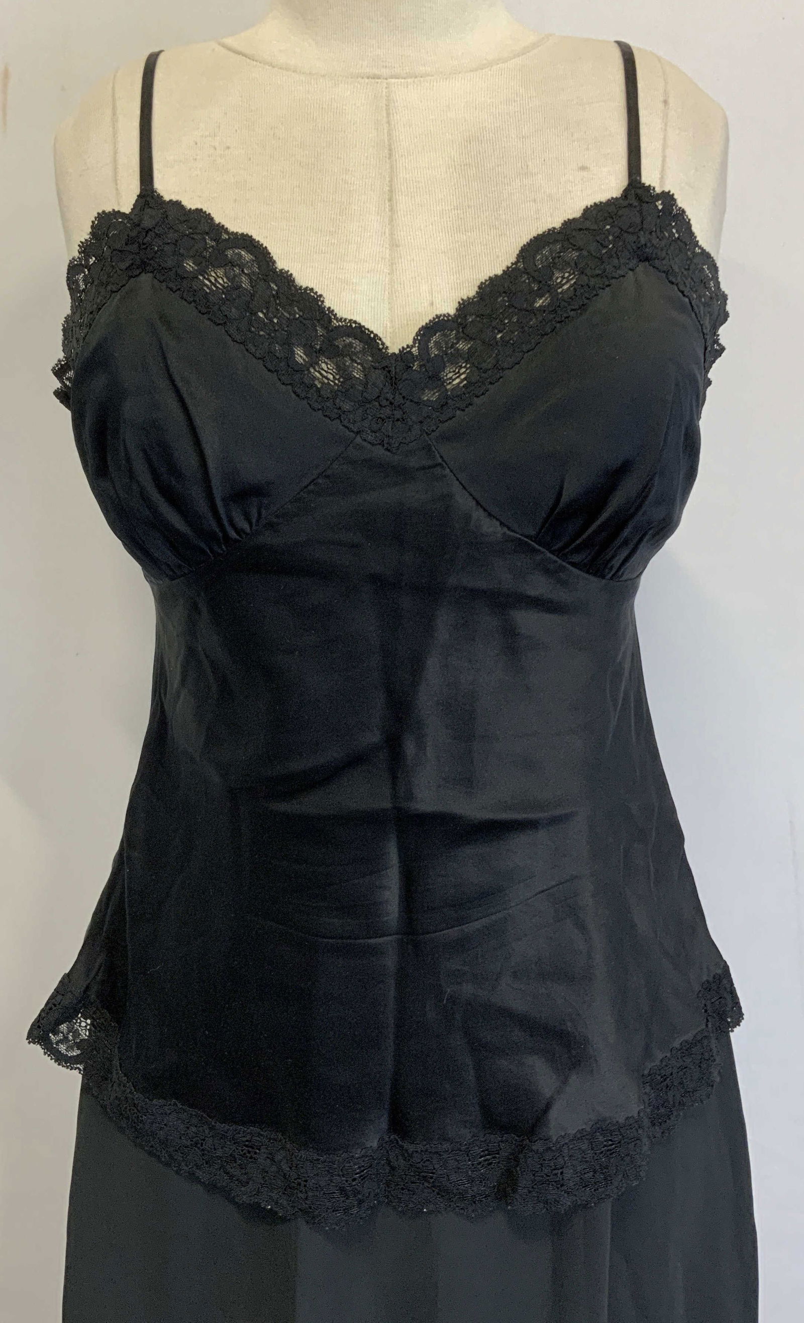 Charles Tyrwhitt Silk Slip Top & Intimage Skirt: Charles Tyrwhitt black 100% silk top. Size US 10, UK 12. Border has black floral lace. Intimage black 100% polyester slip skirt. Waist measures approx. 10 in. With elastic waist band. Length measures