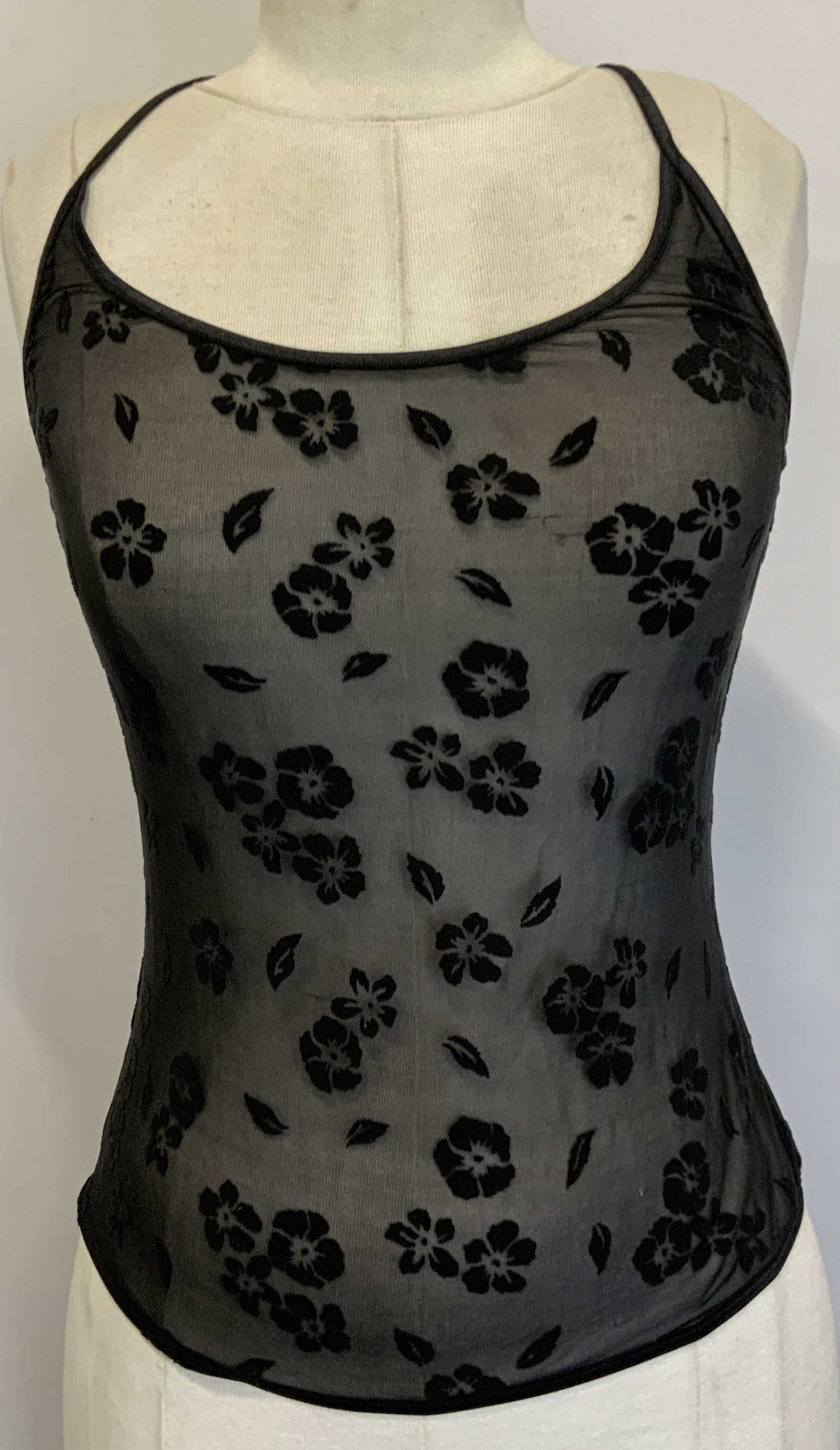 Cosabella Italian Mixed Cotton Floral Lace Top: Black top. Brand is Cosabella, Italian made. Size is XL - XG. 71% cottonial Godon, 23% Nylon/Poliamida, 7% Spandex/Elastane. Shirt has a floral and leaf motif throughout. Shirt is translucent. Womans 