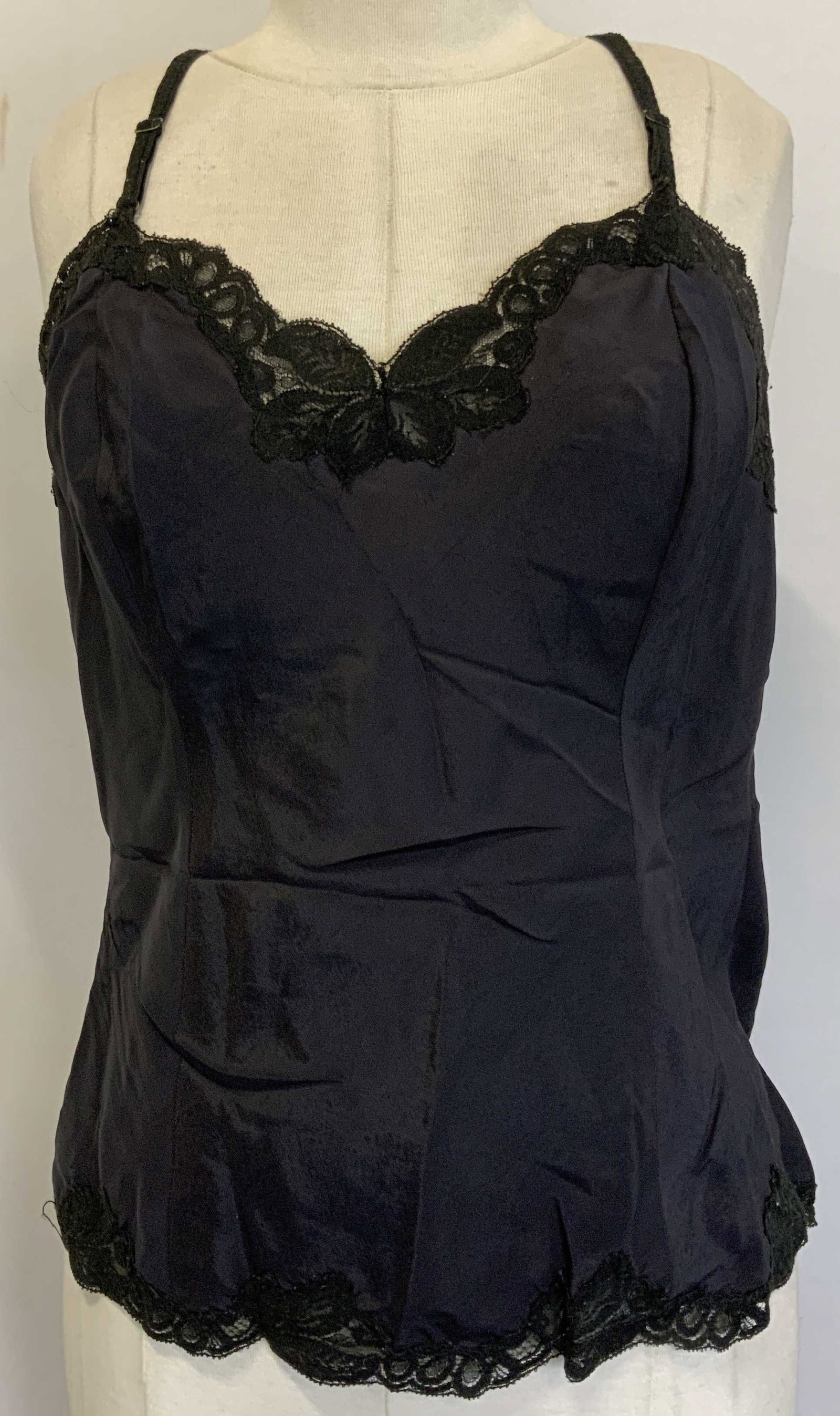 Lot 3 Black Satin Tops with Lace Accents: Lot 3 Black Satin Tops. Lady Lynne brand top. 45% Nylon , 35% Rayon, 20% polyester. Size L. No lace accents, no adjustable straps. Black satin with lace on top and bottom, no tags or brand names. 17 i
