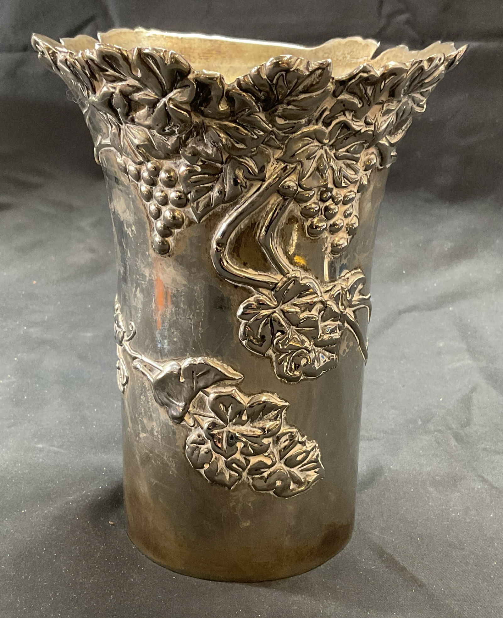 Vintage Silver Plated Grape Wine Cooler, Italy: Vintage silver plated wine cooler with raised grape vine pattern. Made in Italy. Handcrafted. Piece has weight. Measures approx. 6 x 7.5 inches. Some surface wear including scratching and patina obser