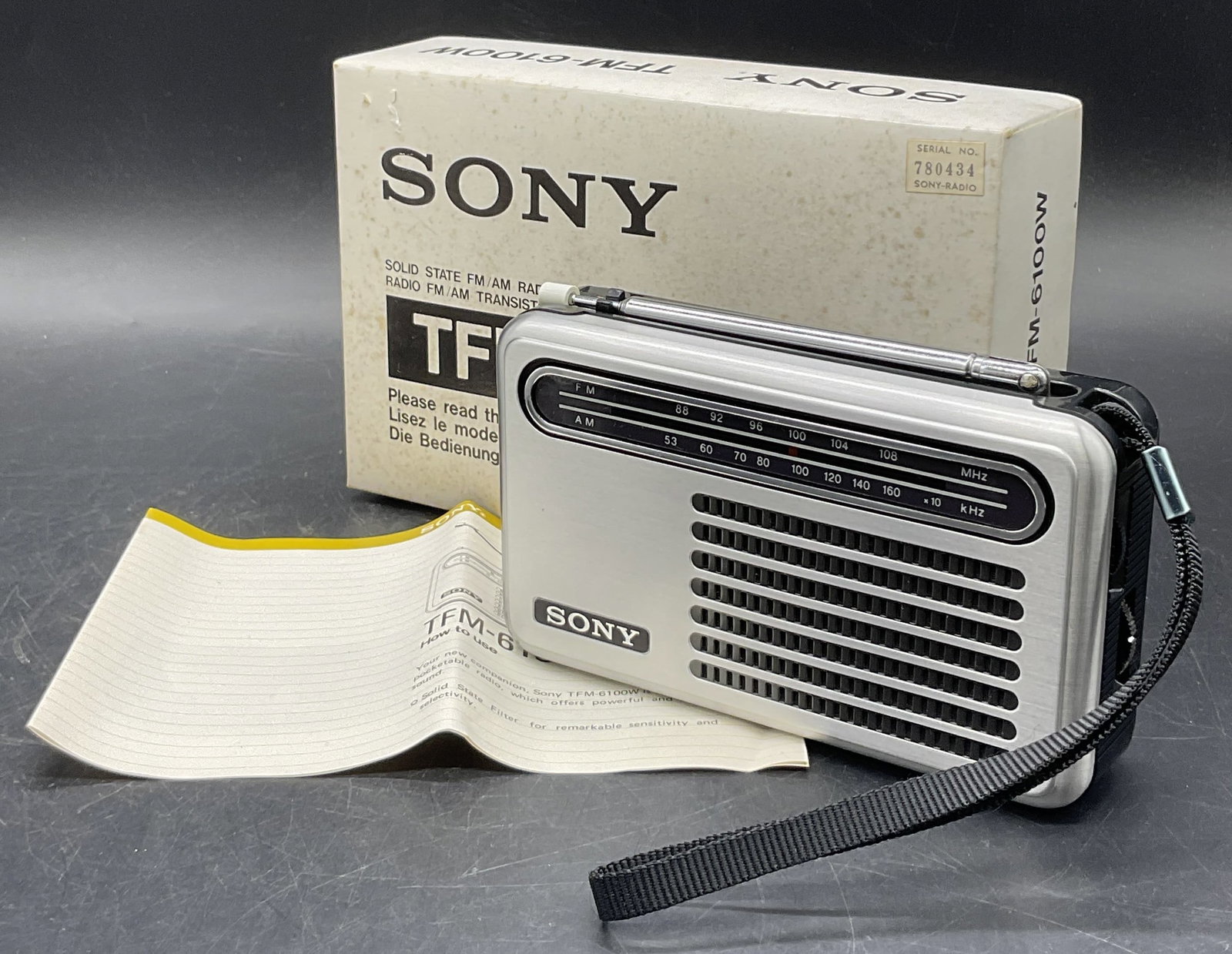 SONY TFM-6100W FM/AM Radio, Original Packaging: SONY TFM-6100W FM/AM Radio. Contained in original packaging. Box measures approx. 2H x 8W in. Not tested for function. Discoloration, residue, and surface wear present. home decor, home accents, homew