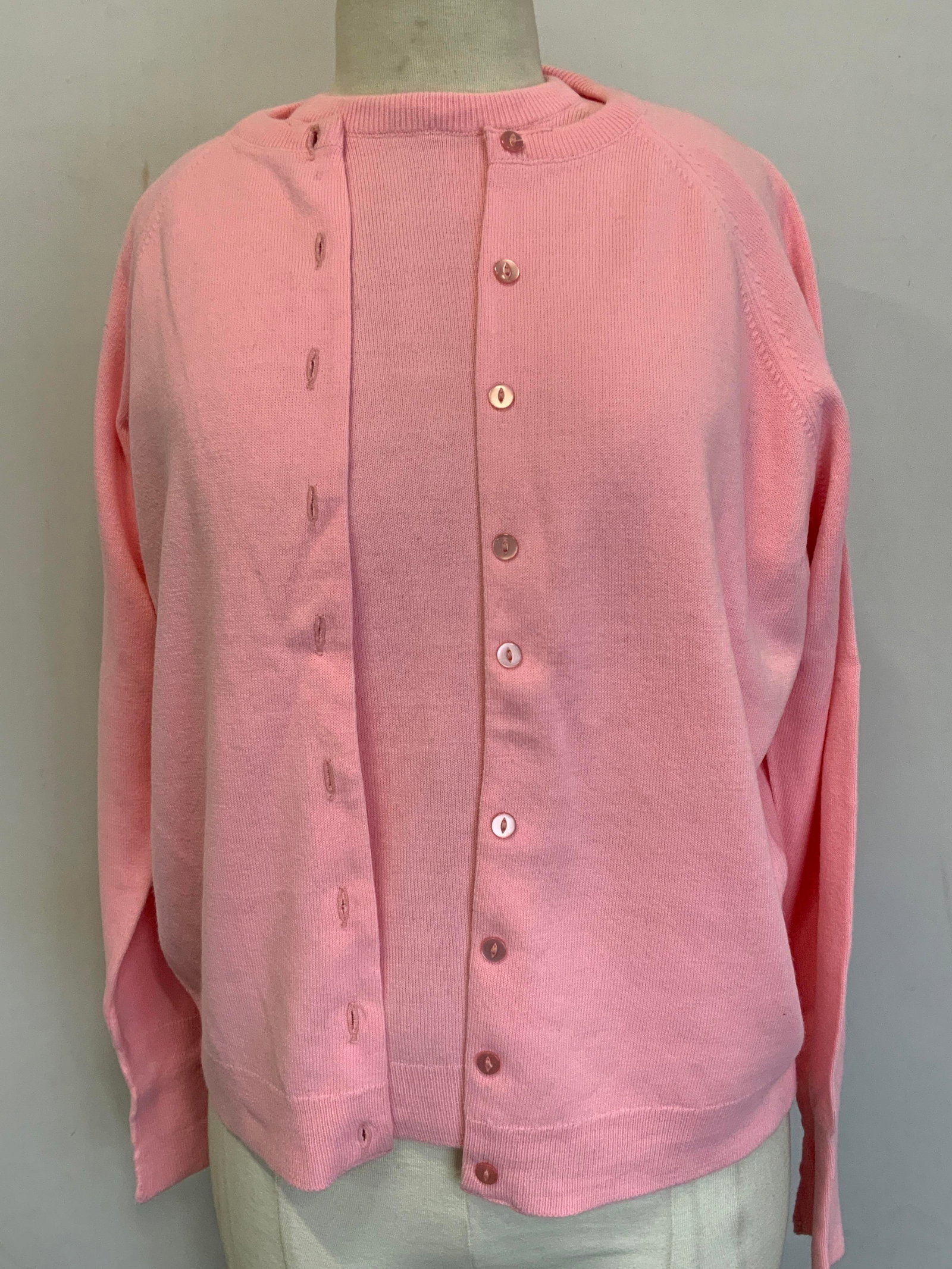 Lots 2 Pink Castle Knitwear Shirt & Cardigan: Two knitwear sweaters. Both by brand Castle. Fully fashioned knitwear. Made in the Republic of Ireland. One pink sweater shirt sleeved. Measures approx. 19 in. Bust, 22 in. length, 17 in. flare. One p