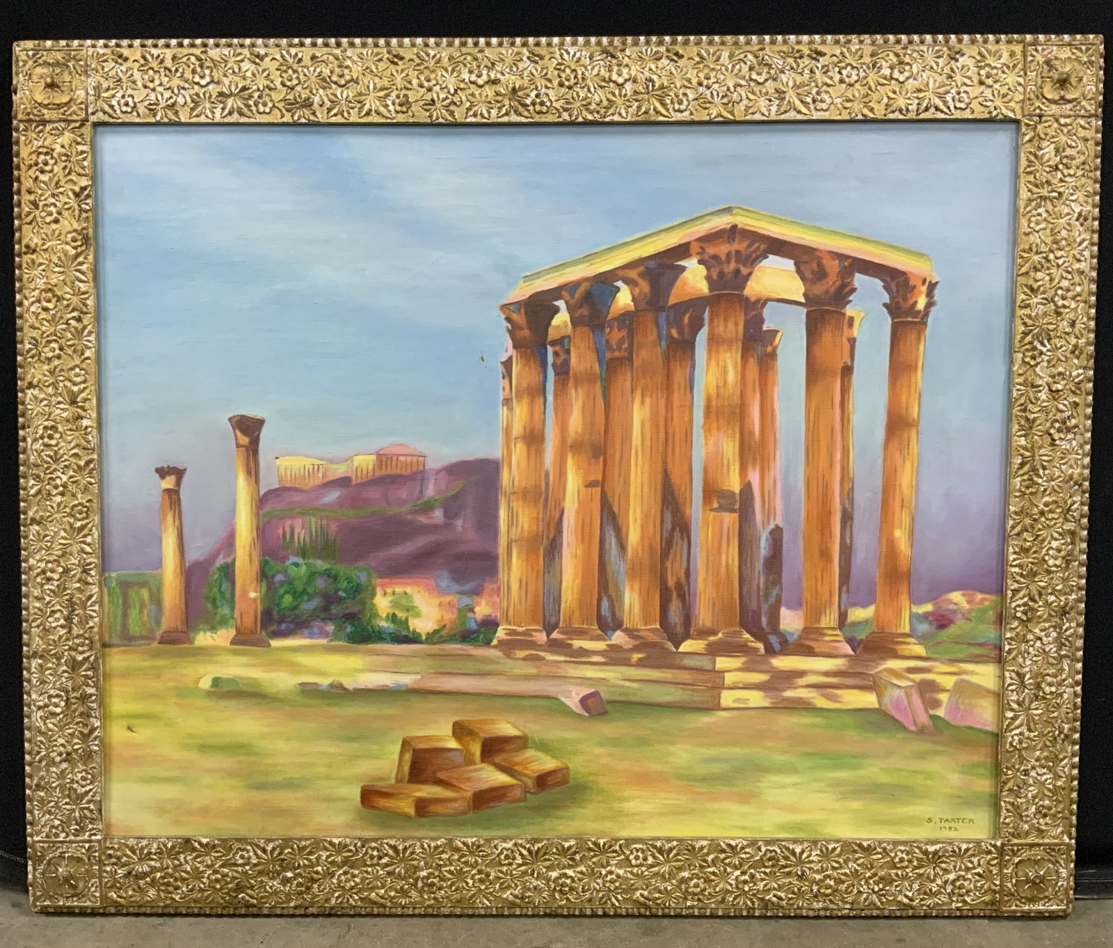 S.Tarter Vntg Greek Temple of Zeus Oil Painting: Oil paint on canvas. Signed in lower right corner. Signature reads S.Tarter. Dated 1952. Subject depicts the broken down ruins of the temple of Zeus. Framed in a gilt wooden frame with raised floral m