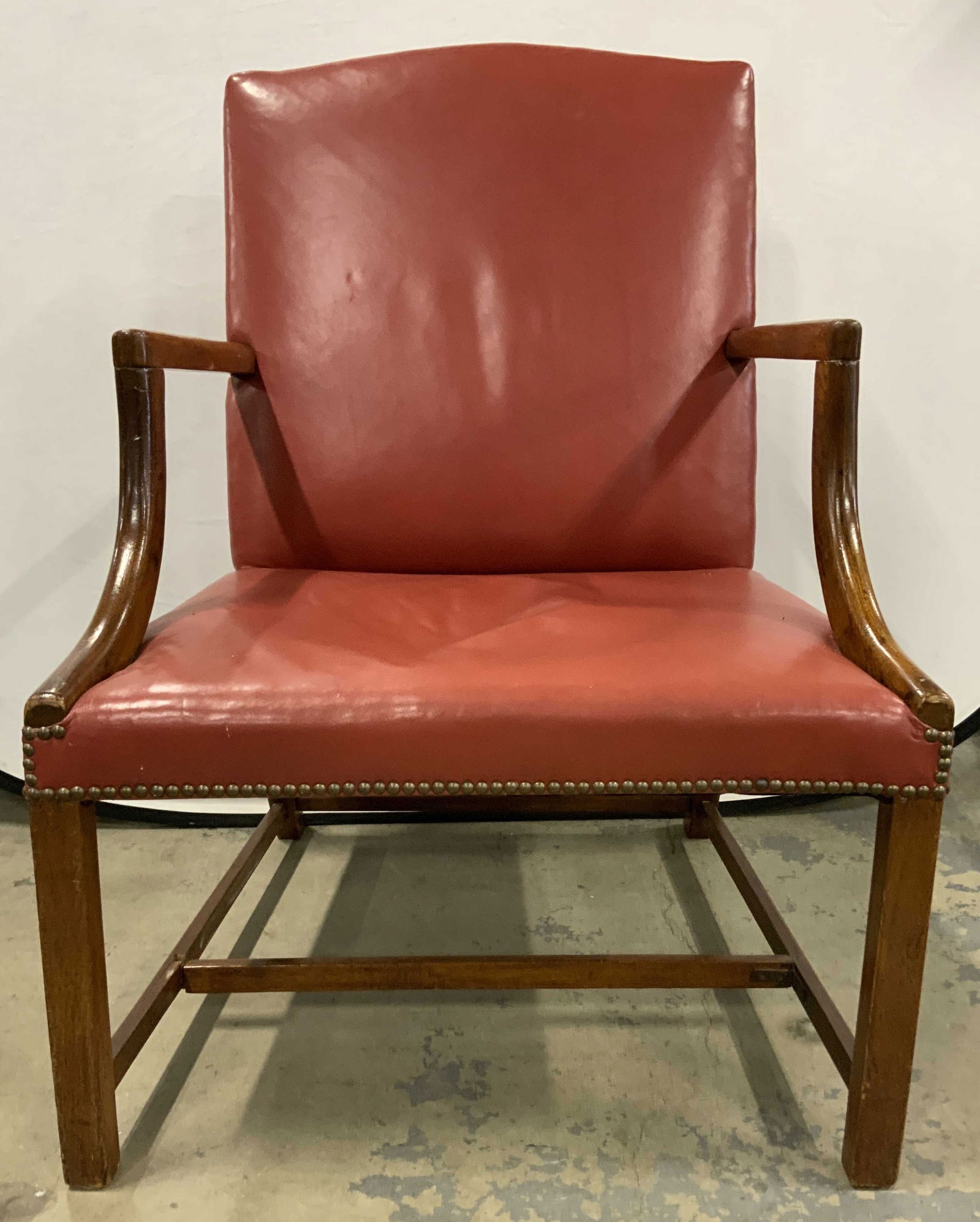 Chippendale Style Red Leather & Wood End Chair: Chair appears to possibly be KITTINGER (no apparent markings) Chair has light brown toned wooden frame. Piece is upholstered in red toned leather. Edges of upholstery have nailhead detail. Chair has w