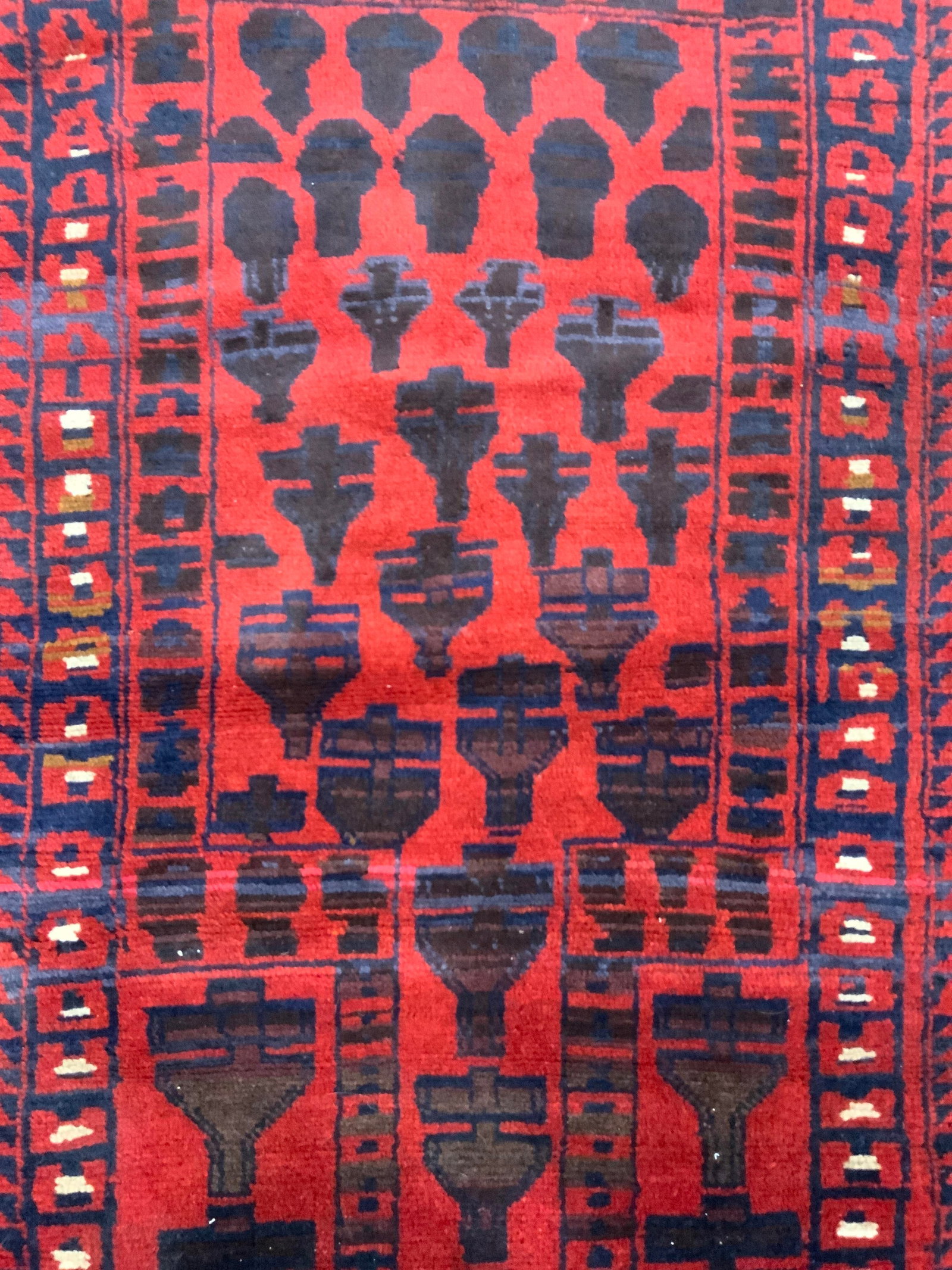 Vntg Handmade Afghan Wool War Rug W Fringes: Rug is handmade and wool. Piece appears to be vintage. Rug has intricate geometric detail. Rug has tan toned fringes at edges. Piece measures approximately 61 inches long 35 inches wide. Rug, Afghan w