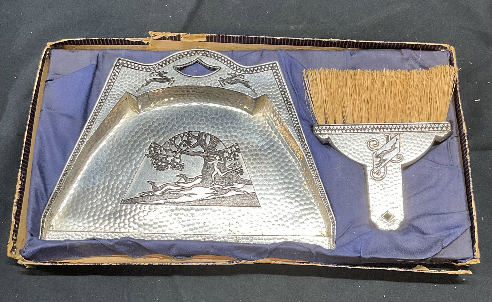 Vntg ASA Japan Silver Tone Crumb Catcher Set: Vintage ASA Japan silver tone crumb tray and brush set. Silent butler set. Silver tone tray and brush with hunt and deer scene motif. Signed on underside of tray. Tray measures approx. 7.5 x 5.5 inche