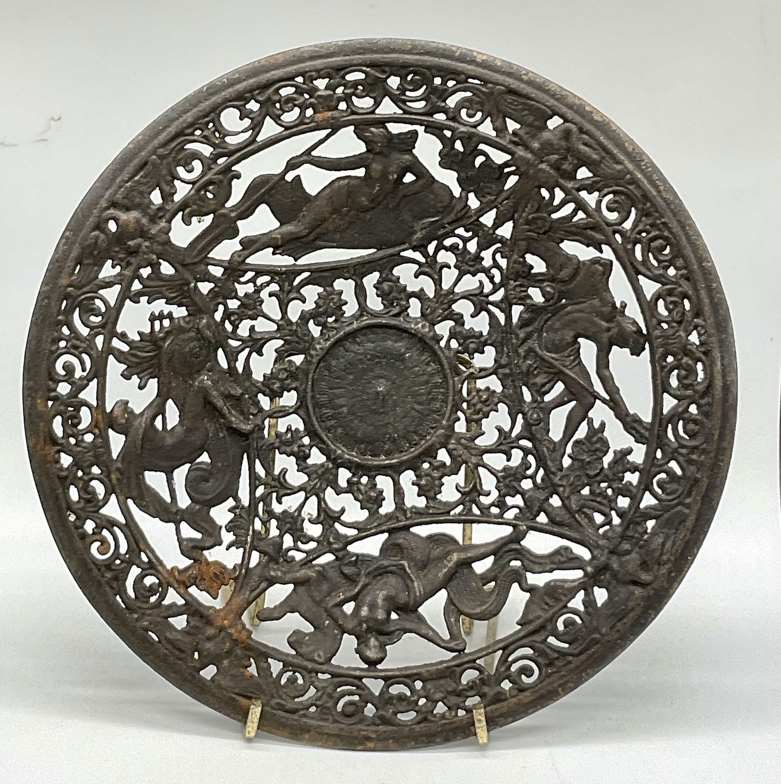 Antique Iron Greek Mythology Nudes Pierced Plate: Antique, possibly vintage, iron Greek mythology nudes pierced plate. Measures approx. 1H x 8.25W in. Rust and surface wear present. home decor, home accents, homewares, housewares, home accessories, c