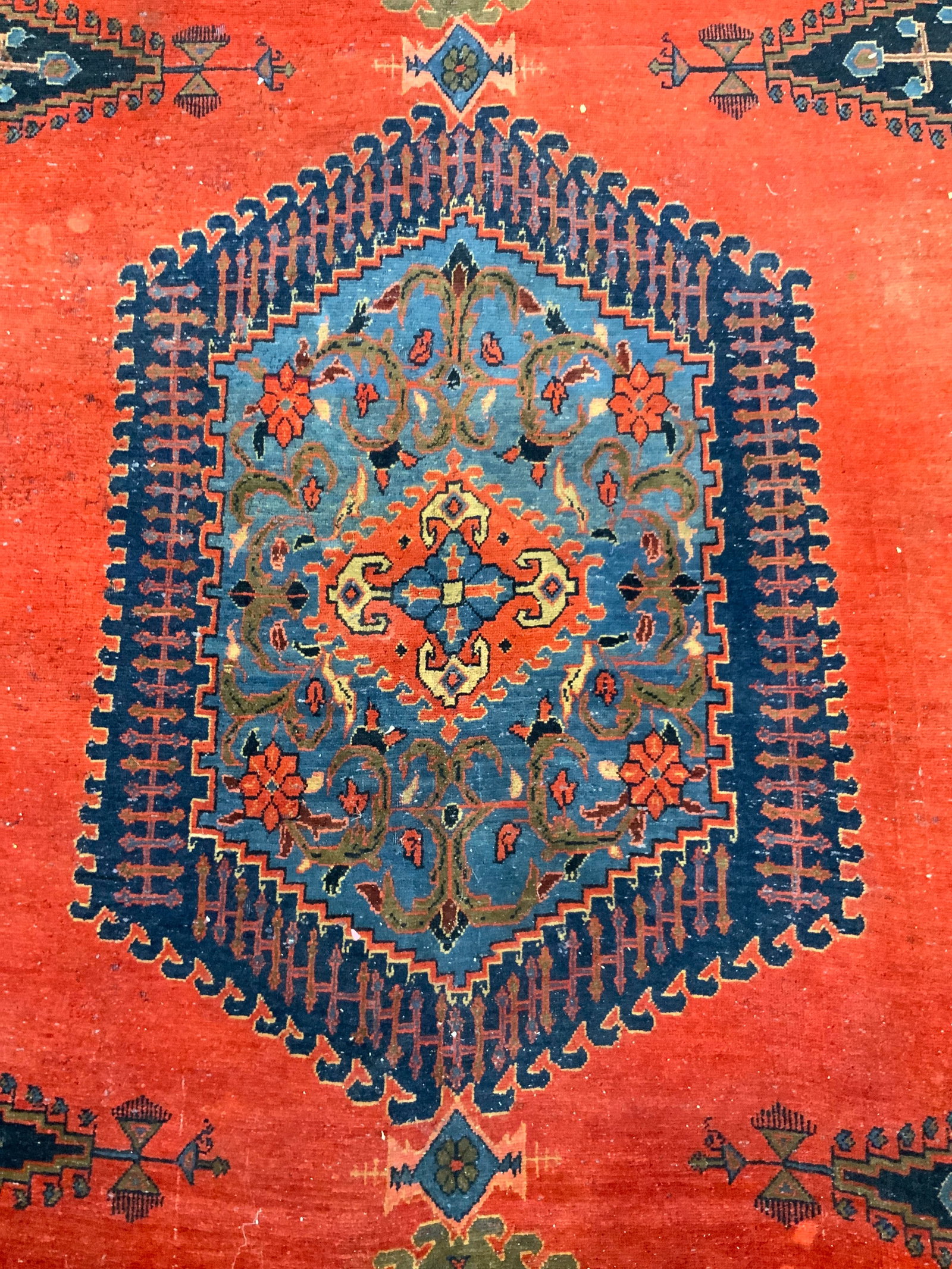 Antique Handmade Persian Wiss Wool Rug Over Size: Rug is handmade and wool. Piece is antique. Rug has intricate multi toned geometric detail. Rug has is over sized. Piece appears to be Persian. Rug has short cream toned fringes. Piece measures approx