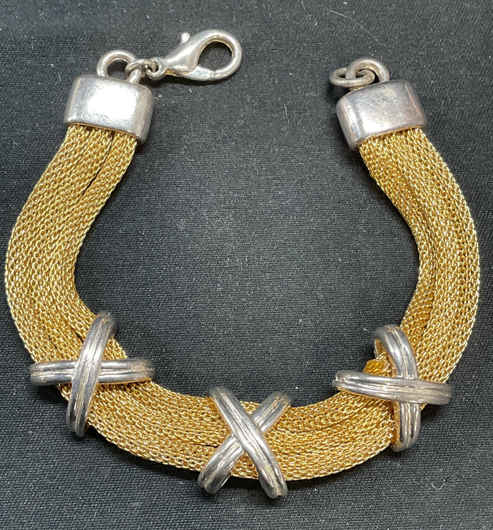 Gold & Silver Tone Mesh Chain X Bracelet: Gold tone mesh chain bracelet with silver tone X panels. Measures approx. 6.5 inches long. Some surface wear including scratching observed. Jewelry, estate jewelry, costume jewelry, cocktail jewelry, 