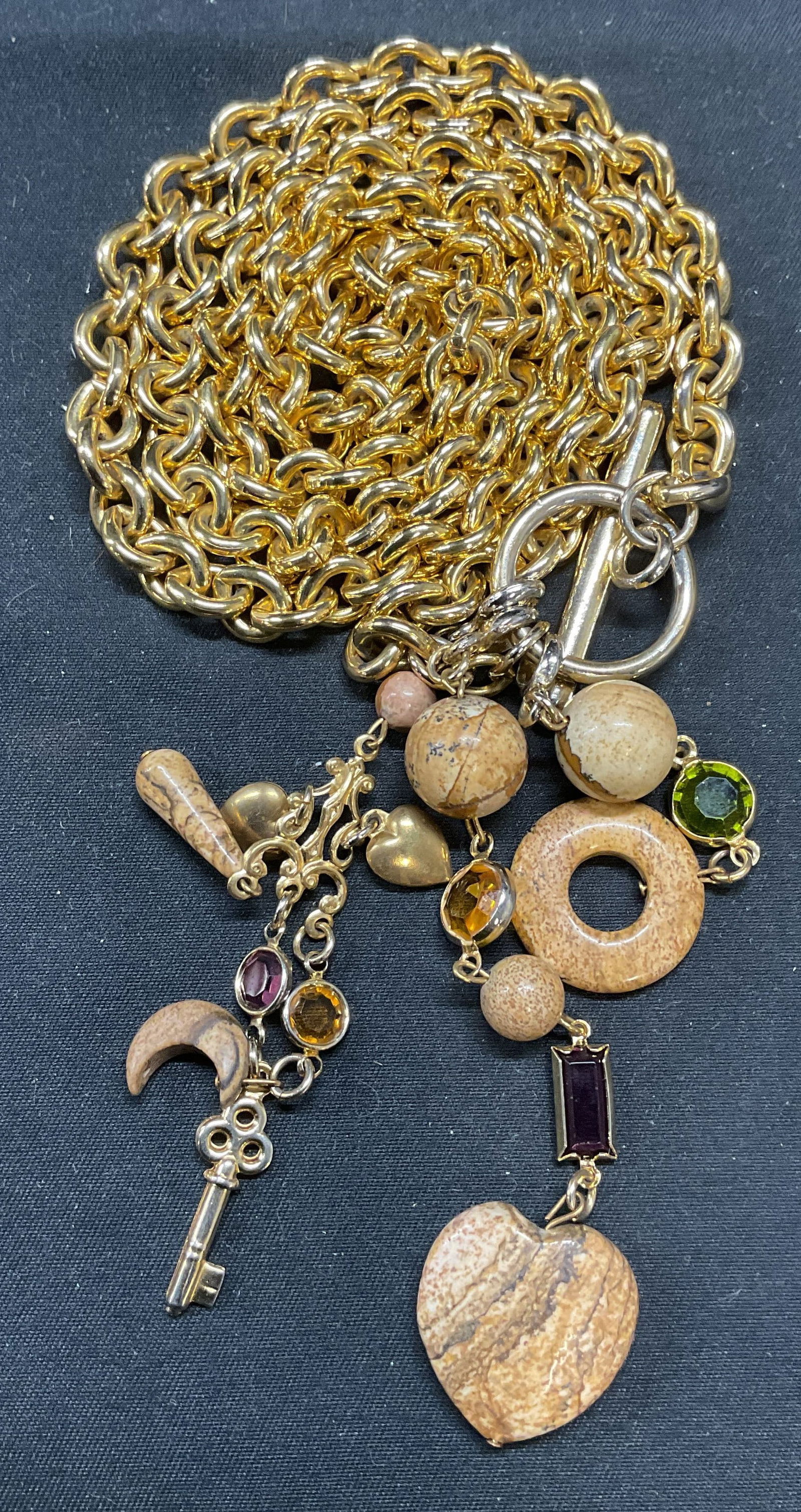 Gold Tone Chain Beaded Stone Fashion Belt: Gold tone chain fashion belt with beaded stone and crystal accents. Measures approx. 30 inches long. Some surface wear including scratching observed. Belt, fashion belt, chain belt, ladies belt, ladie