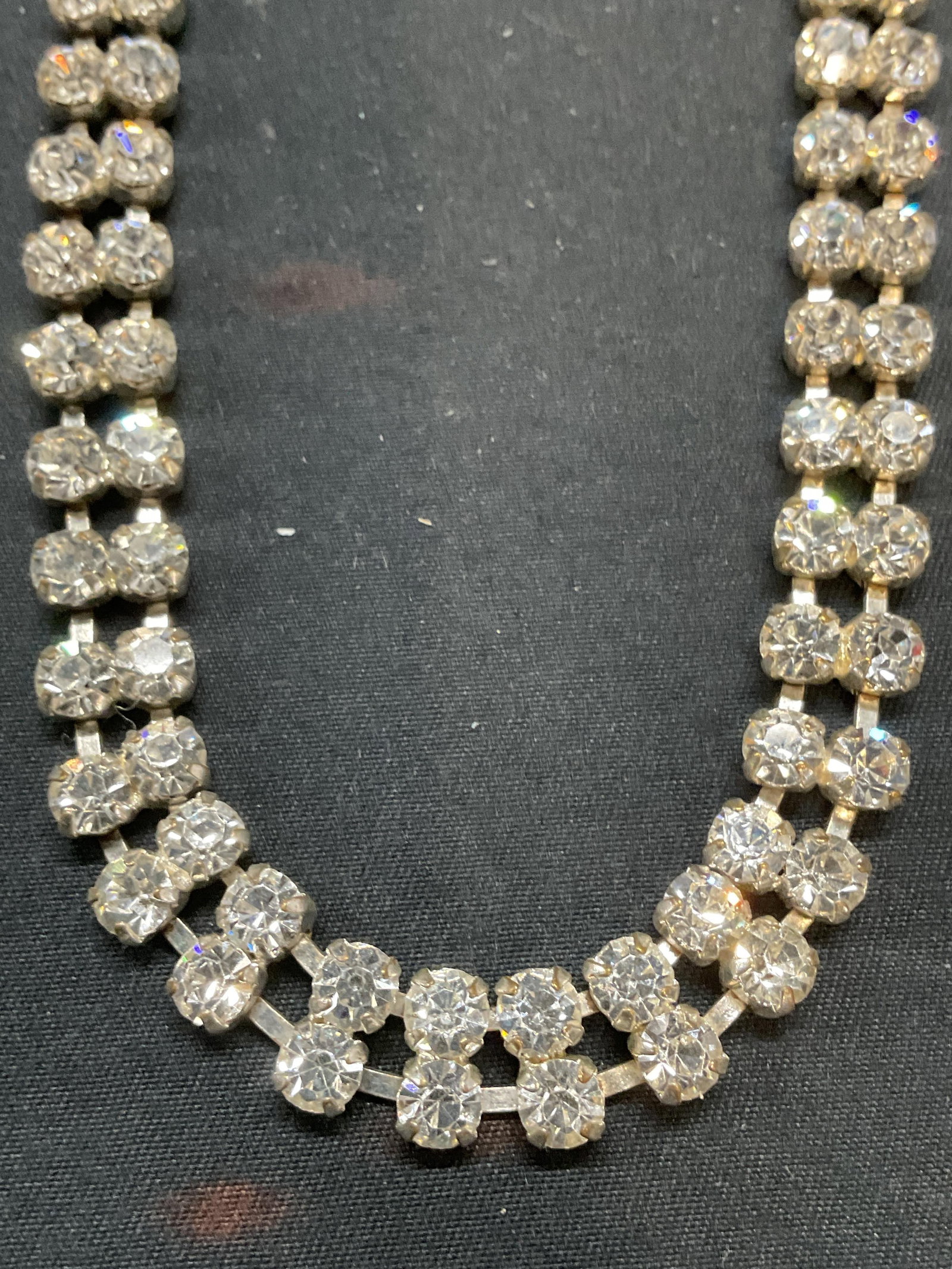 Vintage Silver Tone Crystal Choker Necklace: Vintage silver tone colorless crystal decorated choker necklace. Drop length approx. 5 inches. Some surface wear including scratching observed. Jewelry, estate jewelry, costume jewelry, cocktail jewel