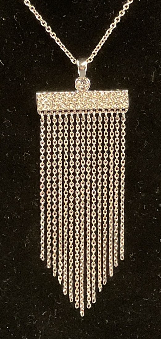Swarovski Touchstone Crystal Pendant Necklace: Touchstone by Swarovski silver tone chain necklace with pave Swarovski crystals pendant and chain decoration. Signed on clasp. Includes box. Drop length approx. 17 inches. Pendant measures approx. 3.5