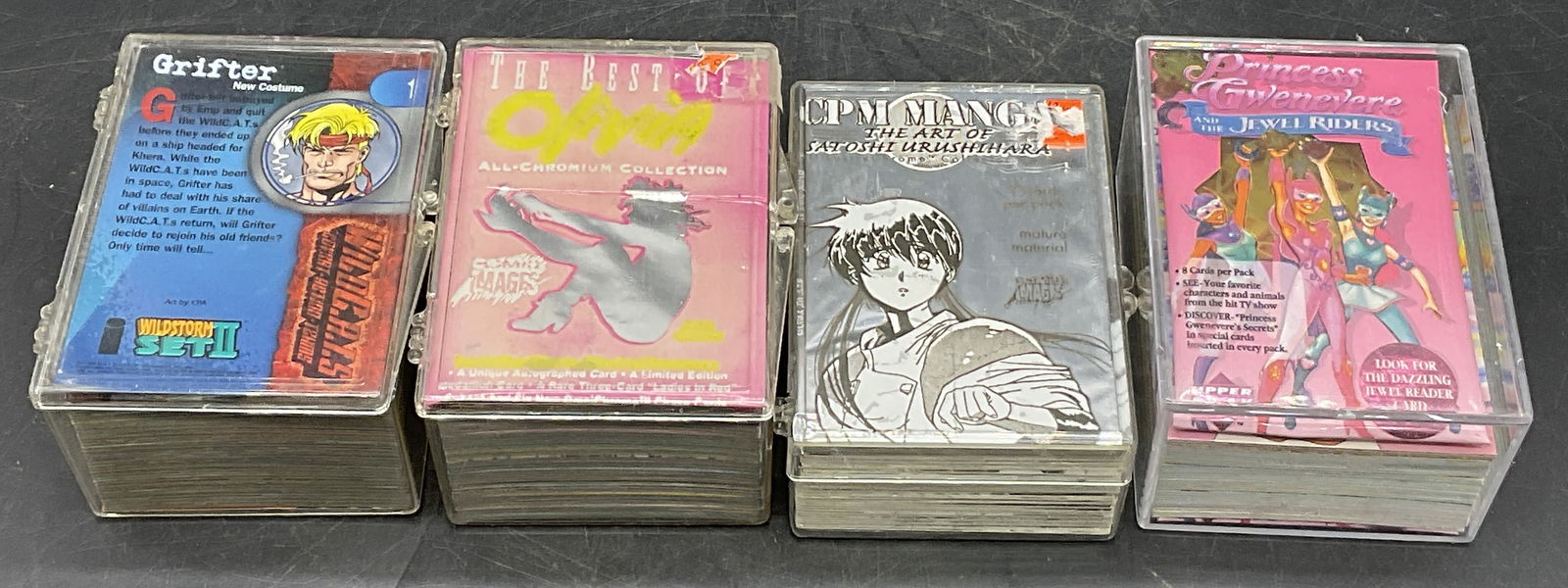 Grp Lot Collectible Trading Cards, Princess Gwen +: A group lot of collectible trading cards. Includes Princess Gwenevere, CPM Manga, The Best of Olivia, and Wildcats. Cards are contained in clear plastic containers. The largest container measures appr