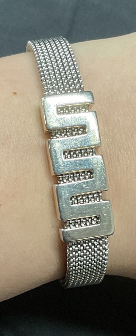 MILOR Sterling Silver Mesh Chain Bracelet, Italy: MILOR sterling silver mesh chain bracelet with pendant. Signed on pendant, marked 925, made in Italy. Measures approx. 2.25 inches wide. Band has some stretch. Total weight .79 ozt. Some surface wear 