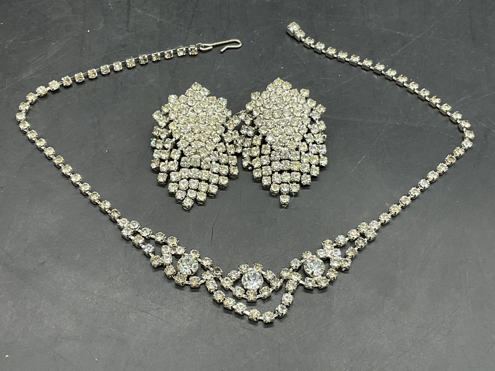Vintage Crystal Earrings & Crystal Choker Necklace: Vintage faceted crystal earrings and choker necklace. The necklace length measured end to end is approx. 14.5 inches. Necklace secures with fishhook clasp. Surface wear consistent with age, use, and e
