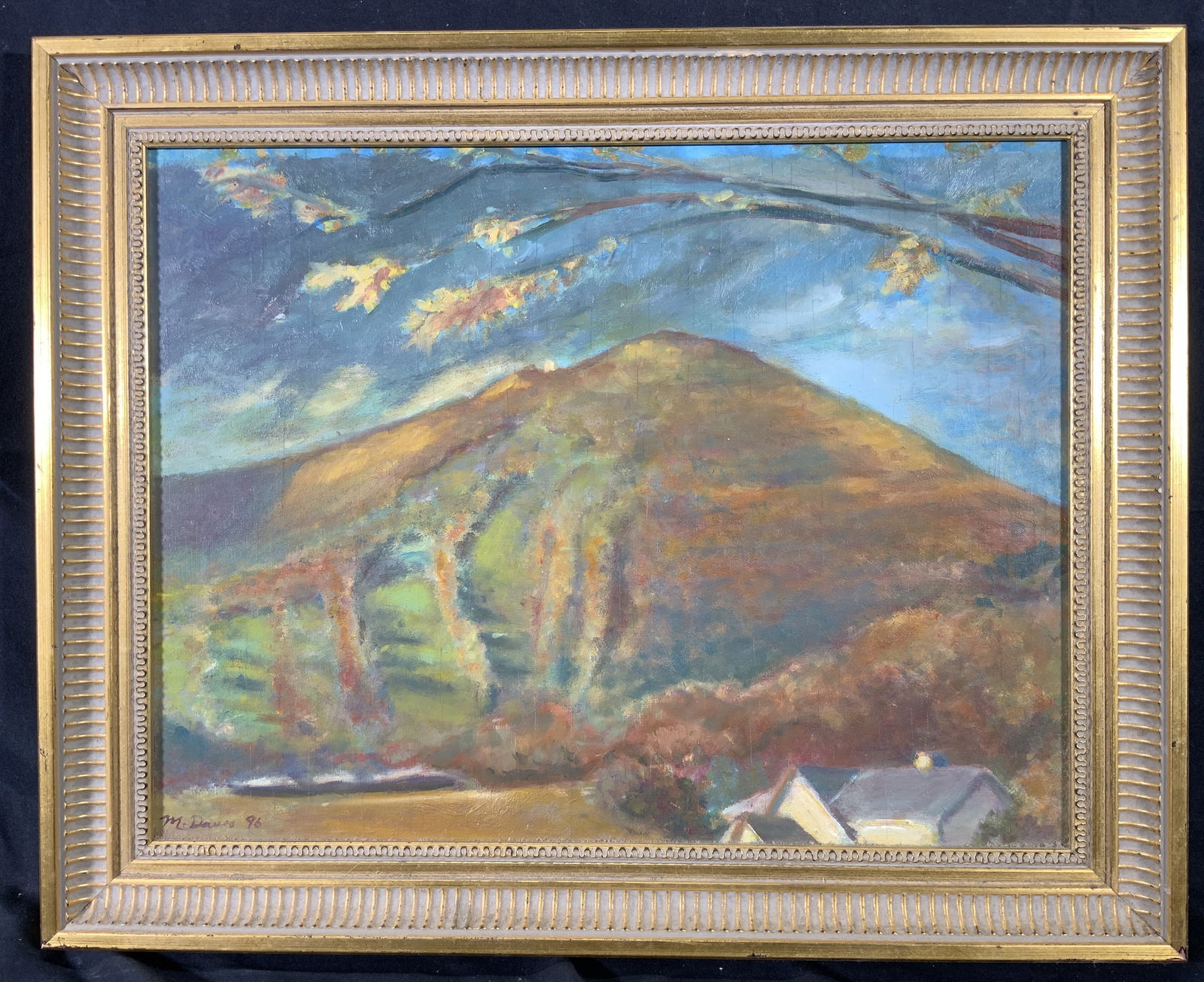 M. Davis 1996 Autumn Mountain Side Painting: Oil Painting on board. Signed in lower left corner. Signature reads M.Davis. Dated 1996. Subject depicts a large mountain side with autumn trees covering the side of it, and the top of a house. Framed