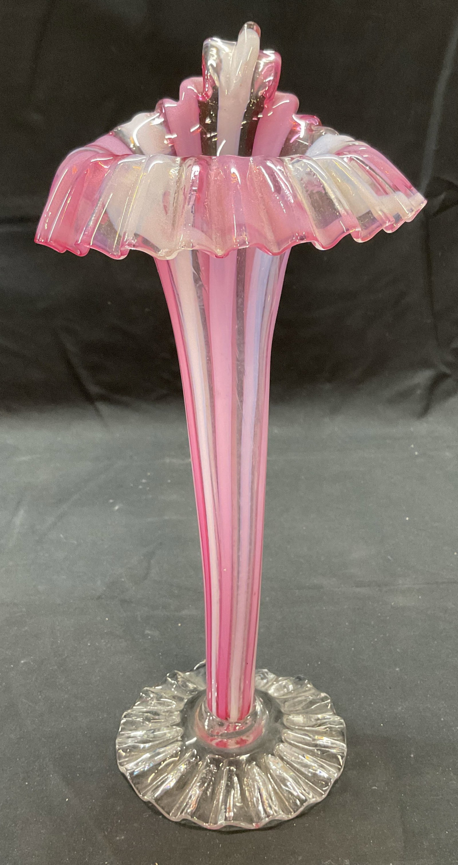 Vintage Pink & White Glass Jack in the Pulpit Vase: Vintage pink and white striped art glass jack in the pulpit vase. Slight green fluorescent hue under UV light. Measures approx. 5.5 x 11.5 inches. Some surface wear including scratching and chip to ba
