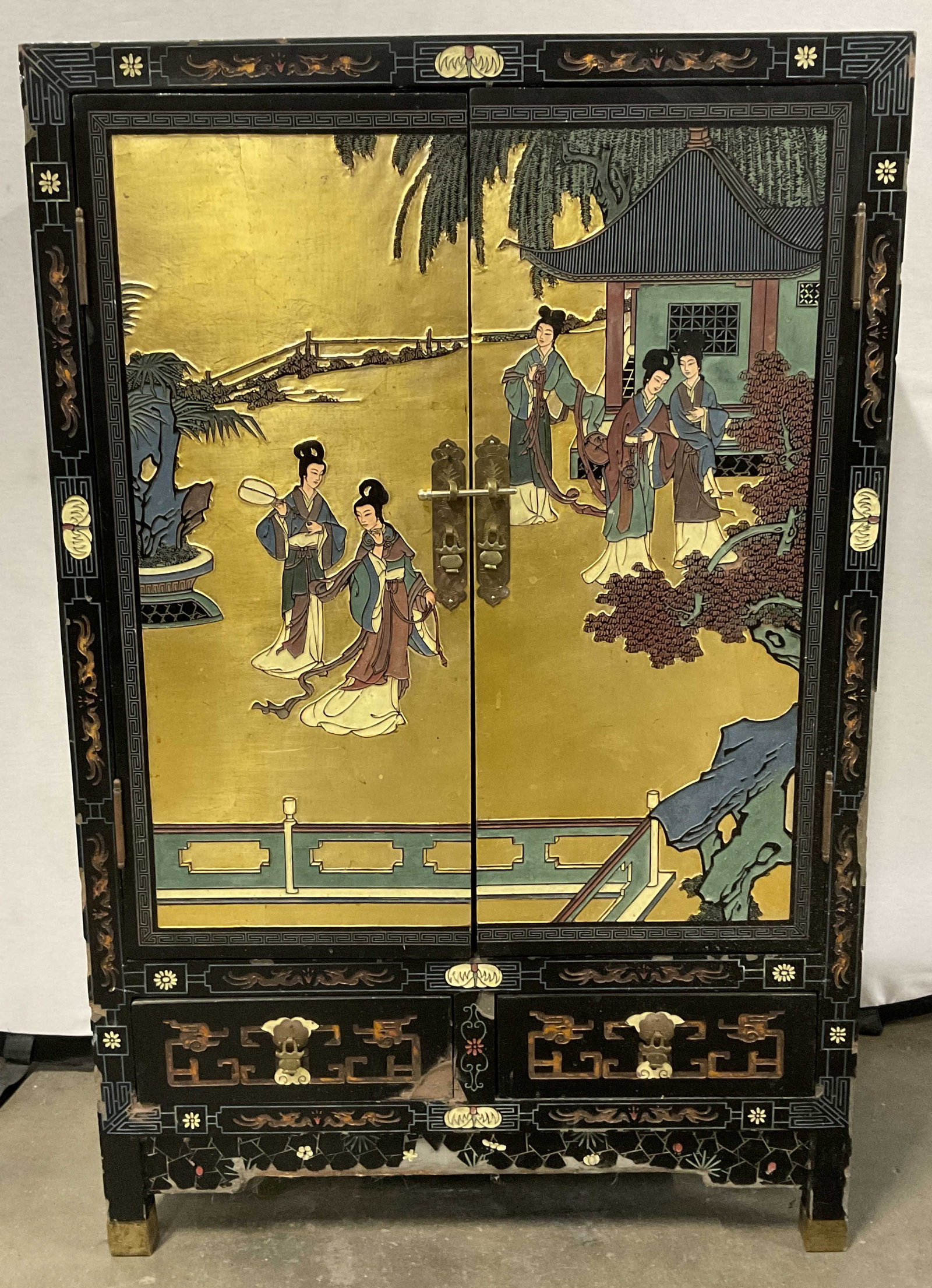 Vintage Lacquer Gilt Enamel Asian Wooden Cabinet: Vintage Lacquer Gilt Enamel Asian Wooden Cabinet. Intricate designs depict people in traditional clothing, buildings, foliage, florals, birds, and geometric patterns. Multicolored hues throughout. Met