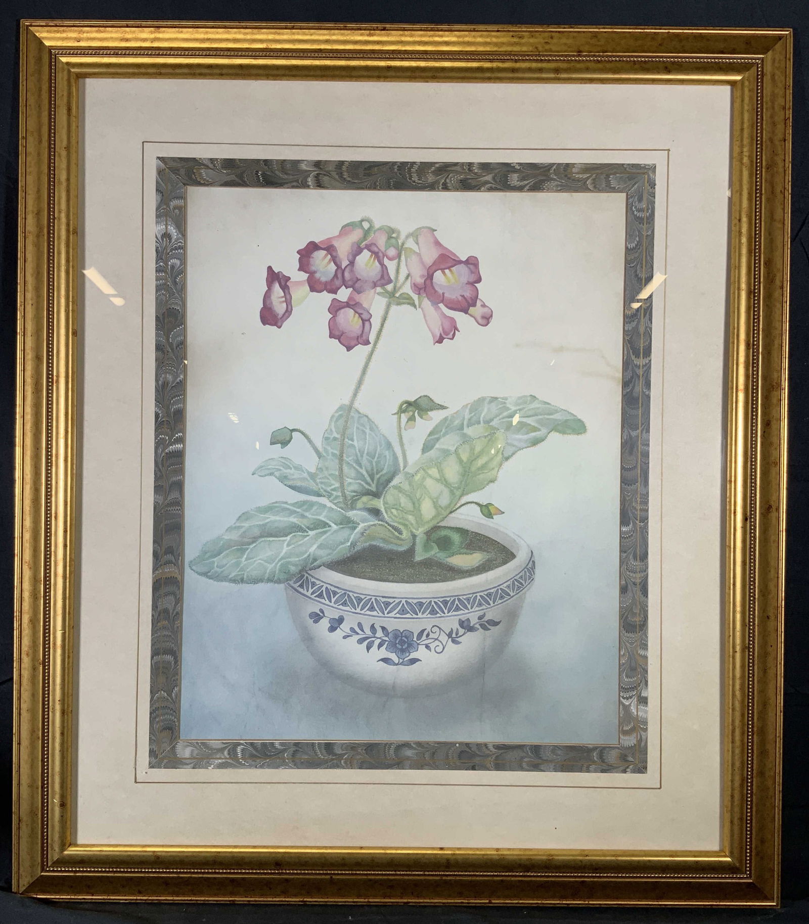 Framed Potted Beard Tongue Flowers Lithograph: Lithograph on paper. Subject depicts a potted beard tongue plant and flowers. Marble border on matte window. Framed in a gilt wooden frame with a raised beaded motif. Frame measures approx. 28 W x 32