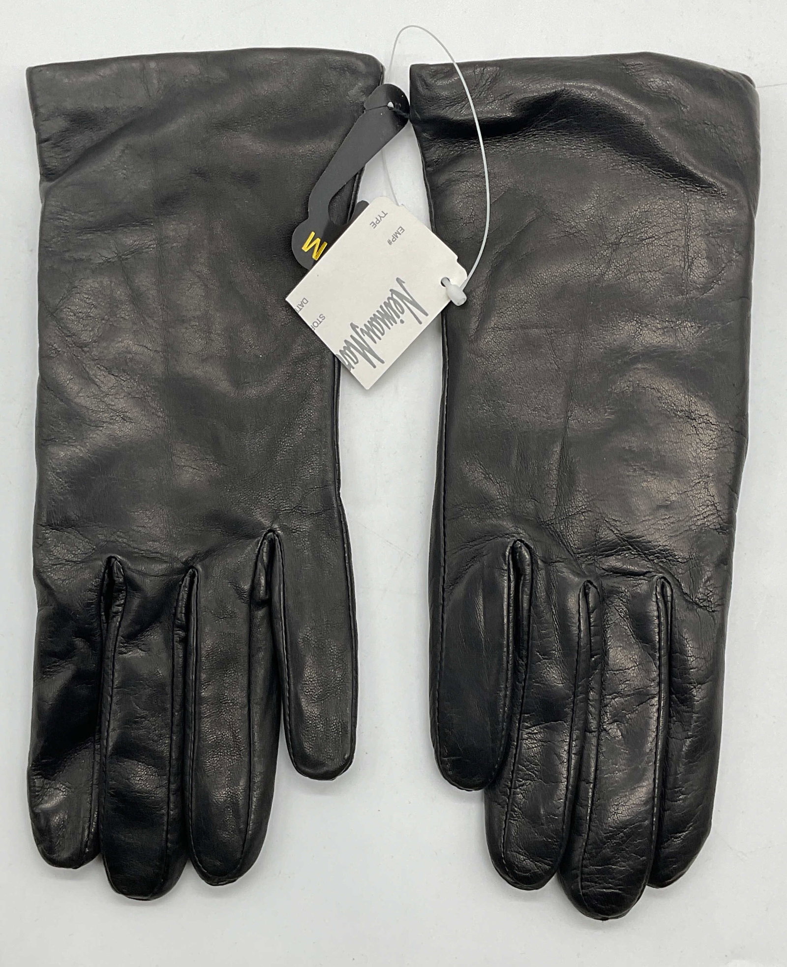 Neiman Marcus Black Leather Gloves NWT: Neiman Marcus black leather and cashmere blend lined gloves. New with tag, size medium. Some wear to material consistent with exposure. Neiman Marcus, Neiman Marcus gloves, ladies designer gloves, lad